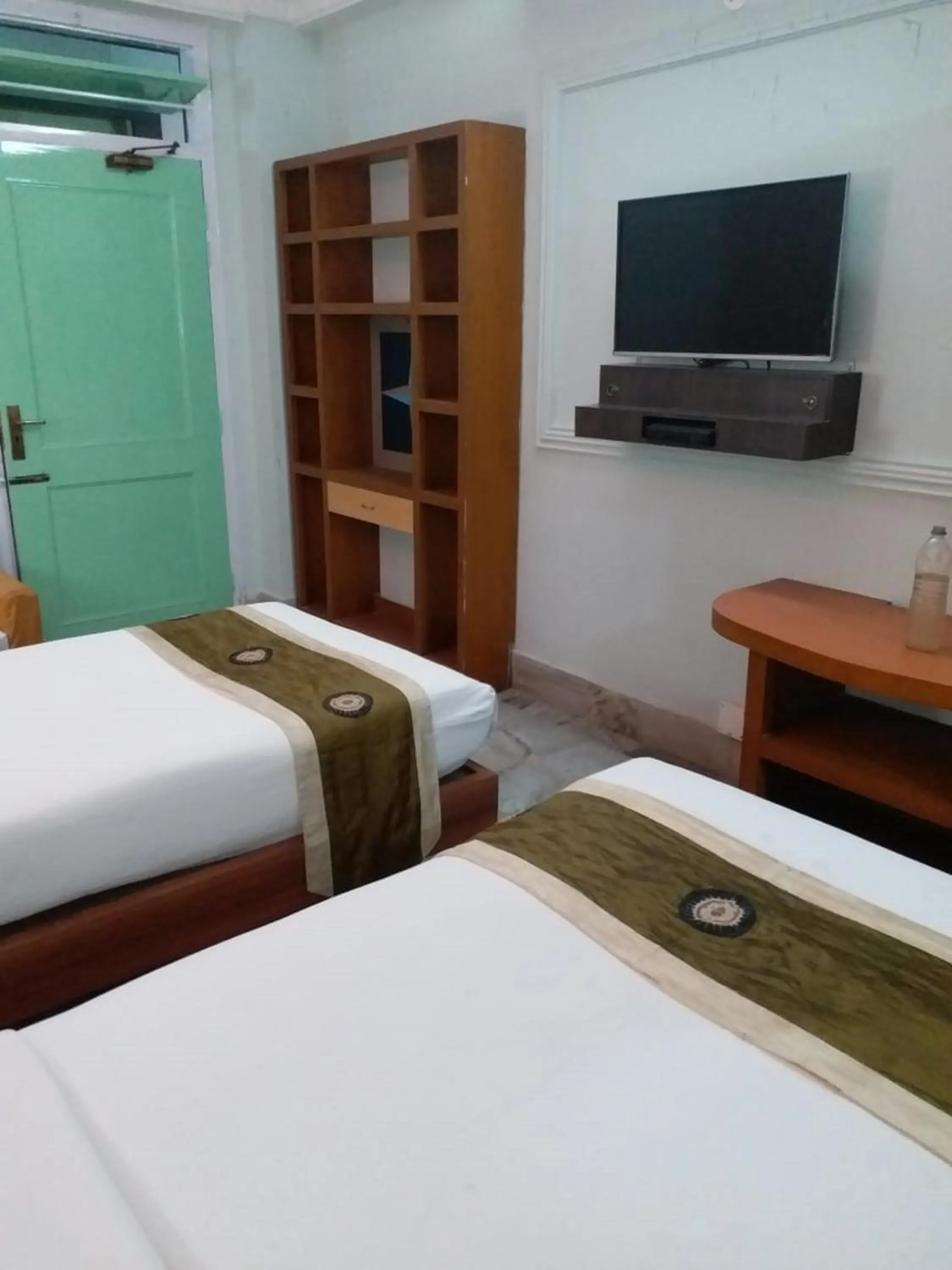 Bedroom, Bed in Hotel Mahalaxmi Indo Myanmar