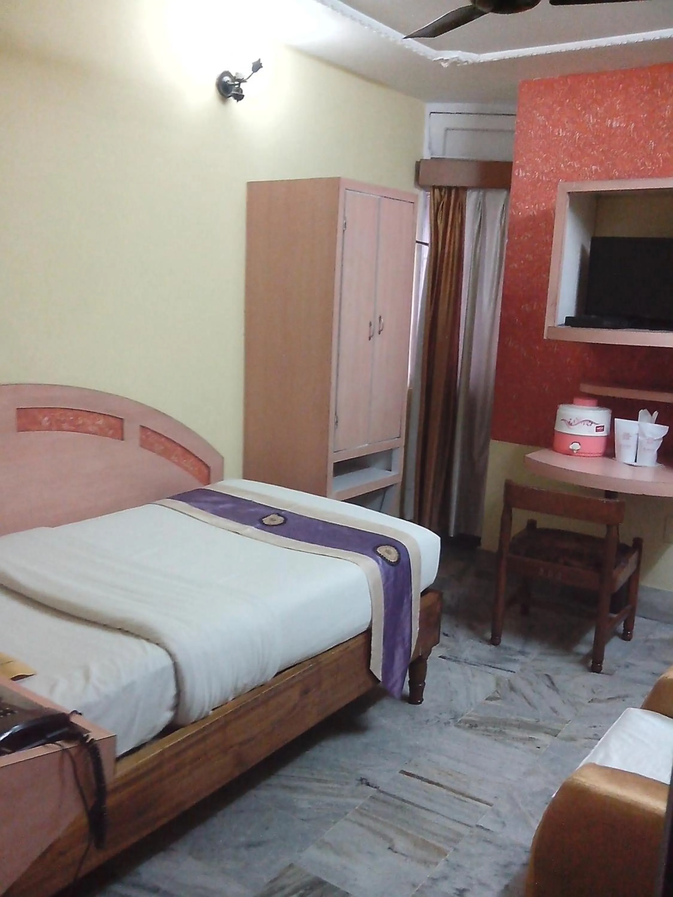 Photo of the whole room, Bed in Hotel Mahalaxmi Indo Myanmar