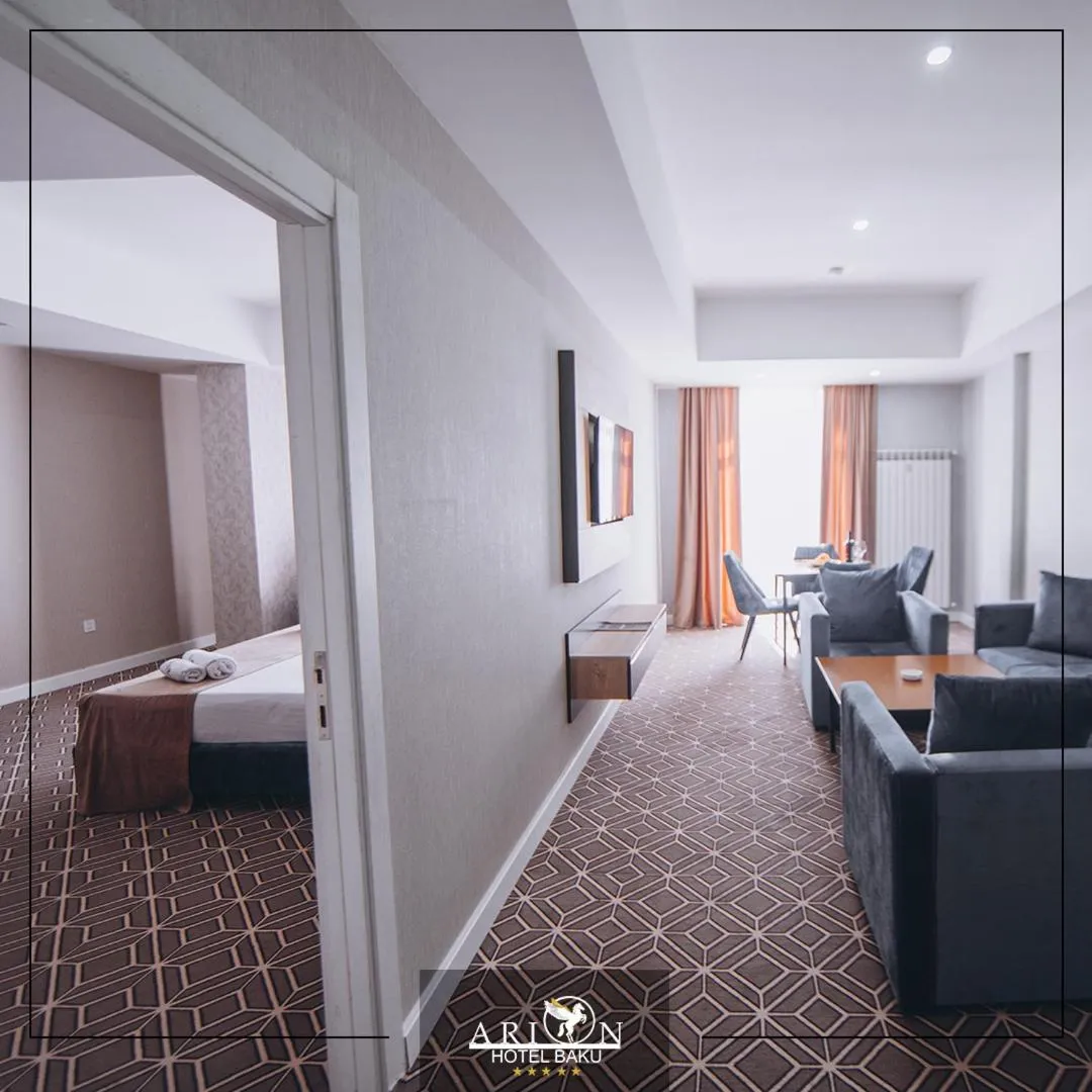 Living room, Bed in Arion Hotel Baku