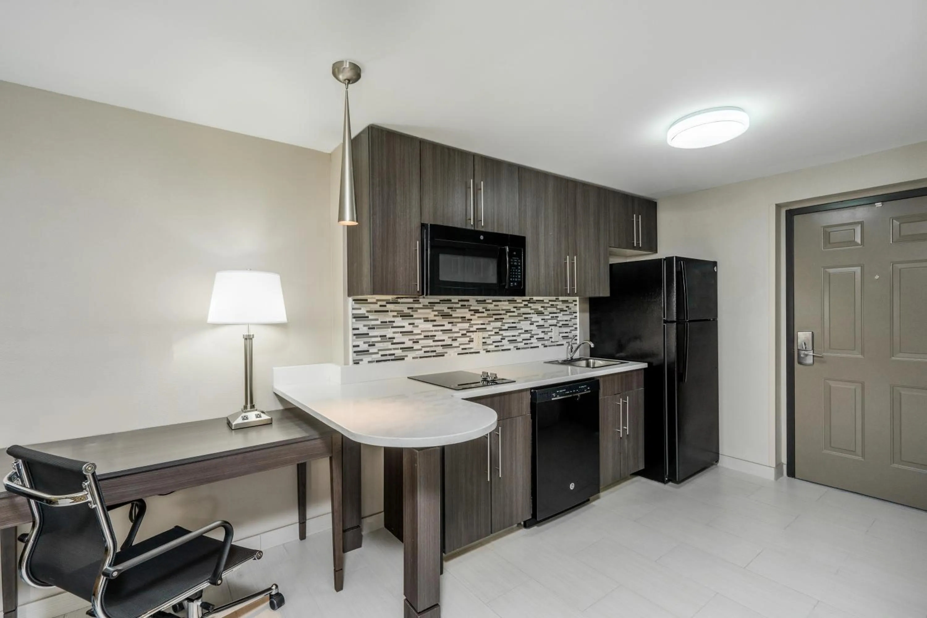 Kitchen or kitchenette in Baymont by Wyndham Clarksville