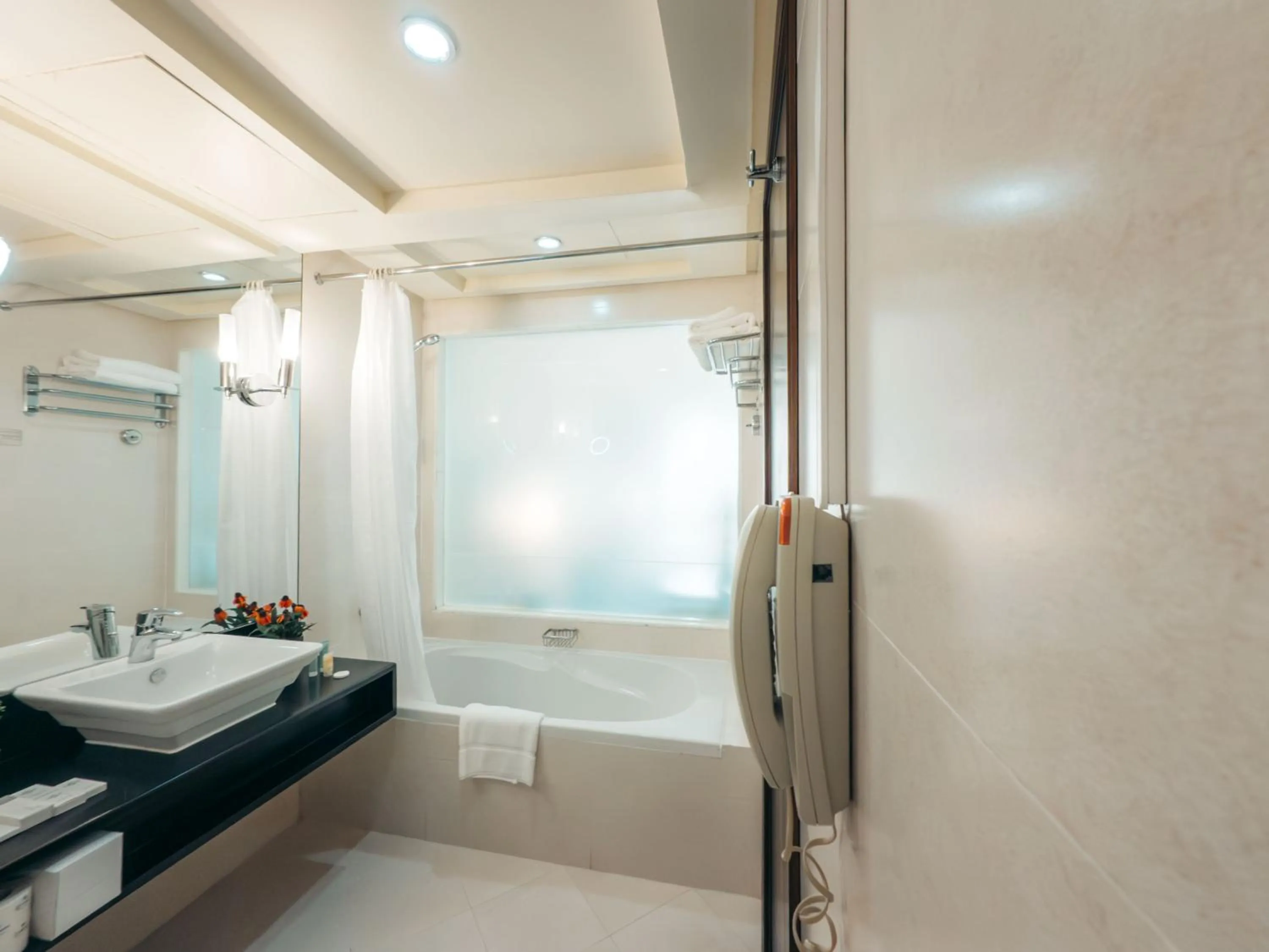 Bathroom in Kingsgate Hotel by Millennium