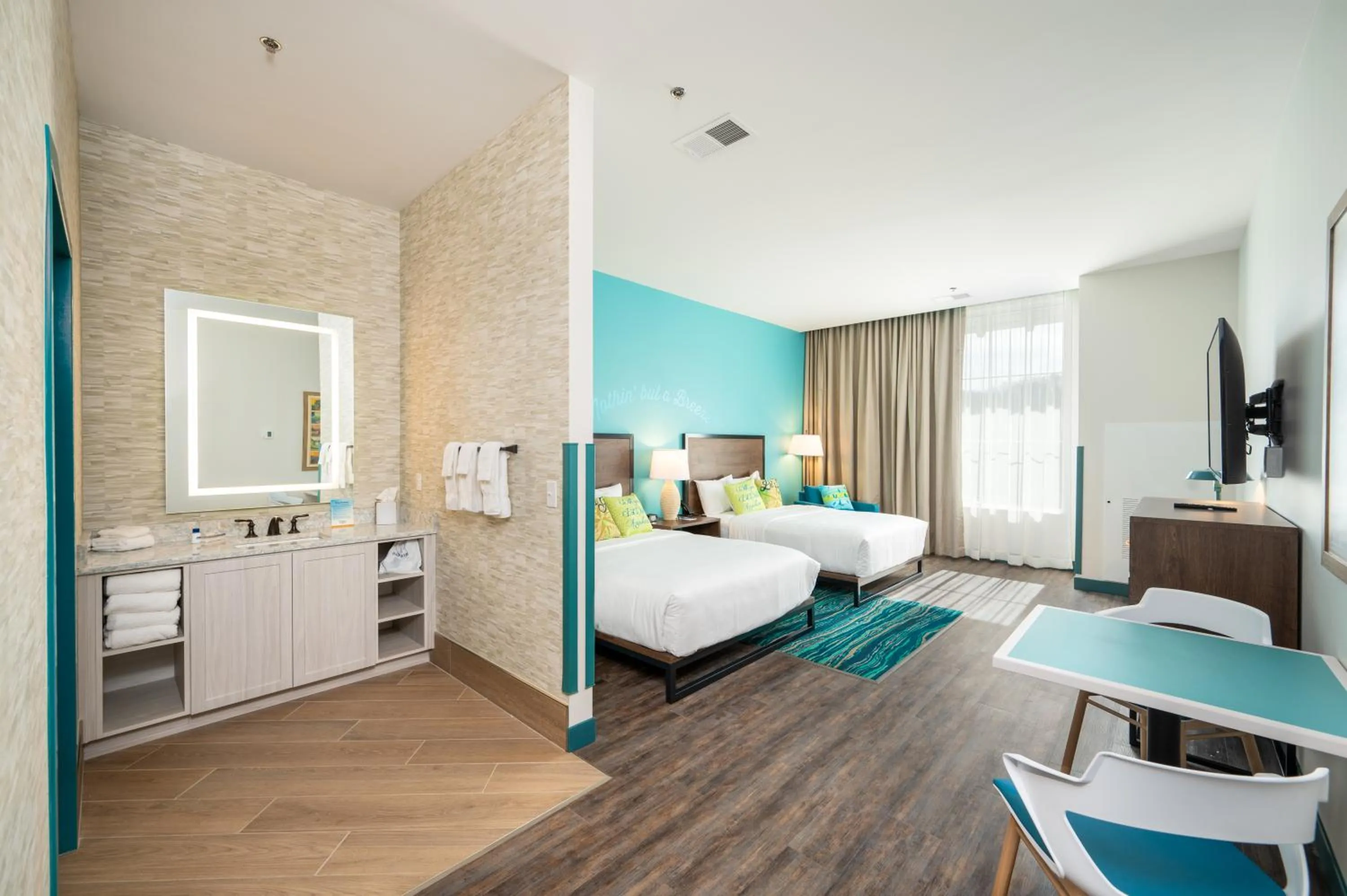 Photo of the whole room, Bed in The Lodge at Camp Margaritaville