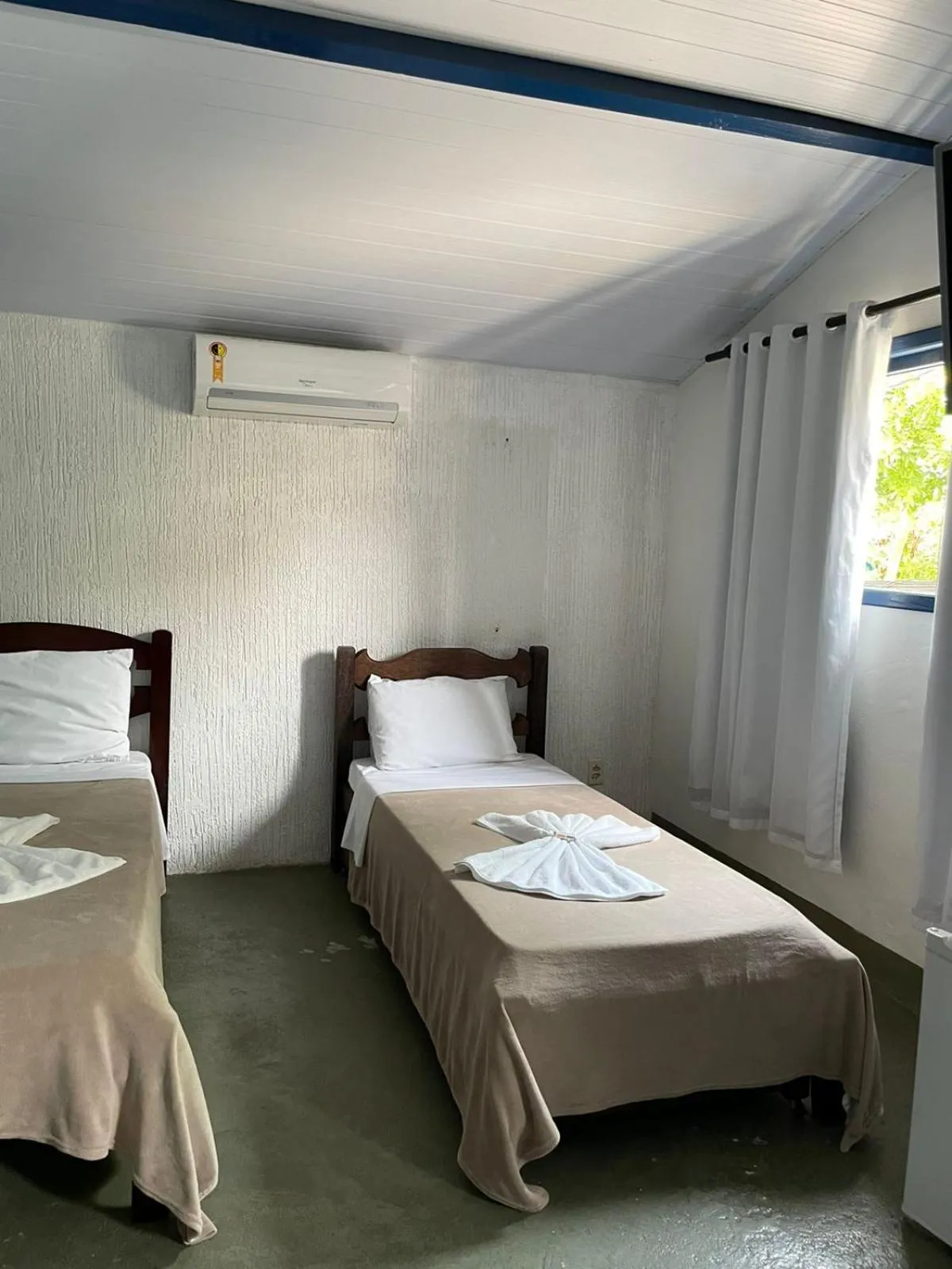 Bed in Pousada Bicho do Mar