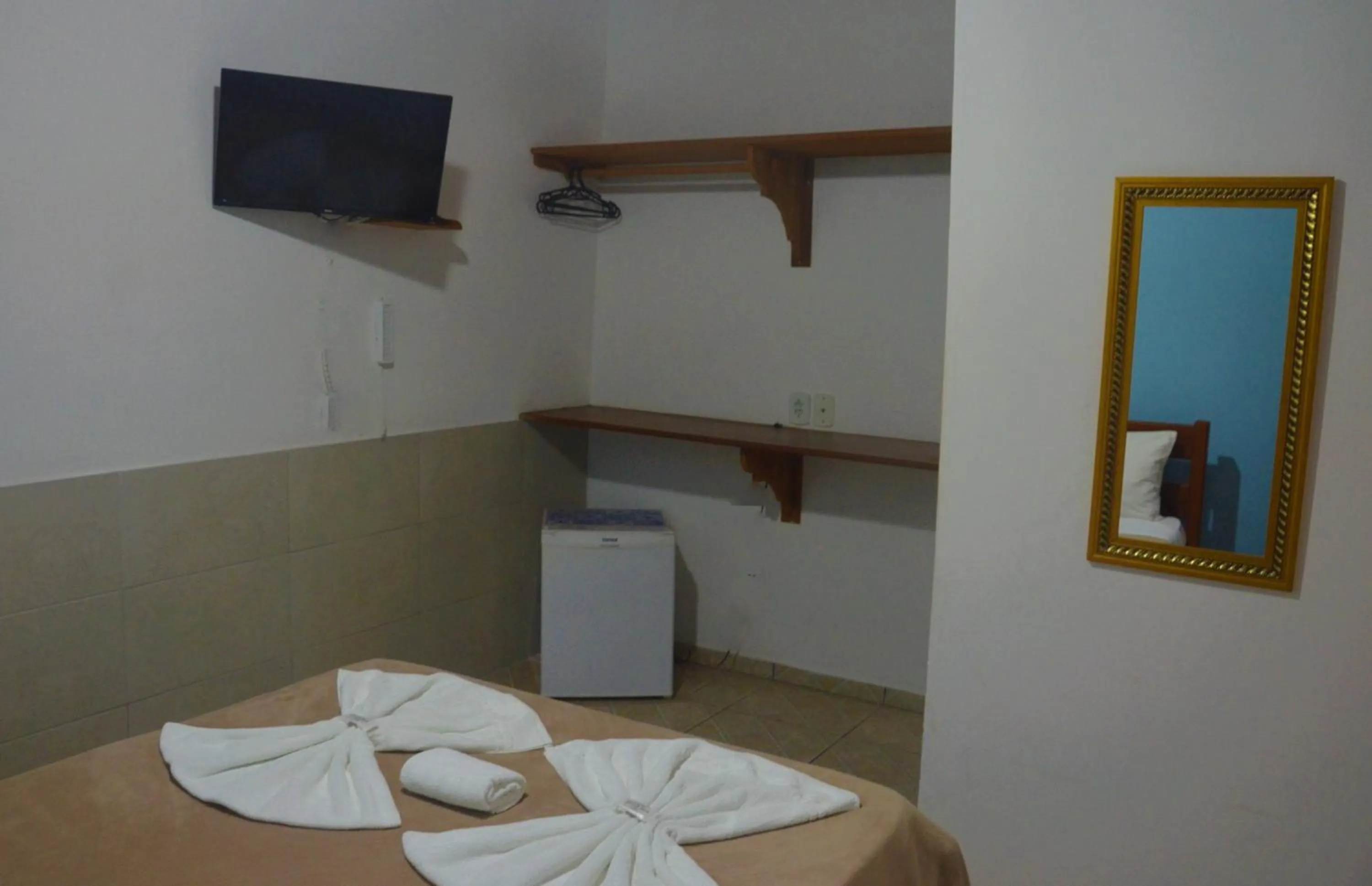 Bed in Pousada Bicho do Mar