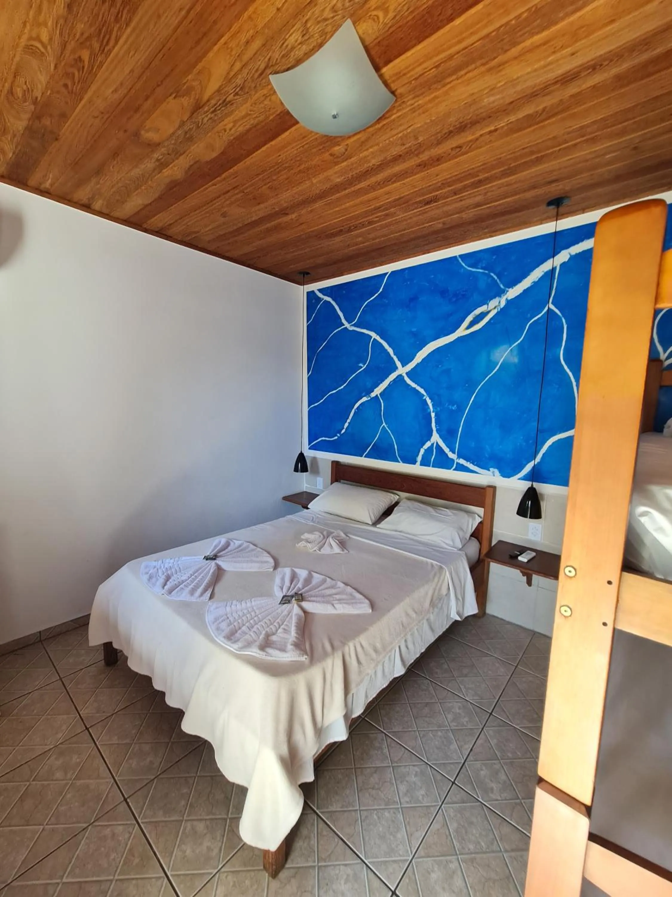 Bed in Pousada Bicho do Mar