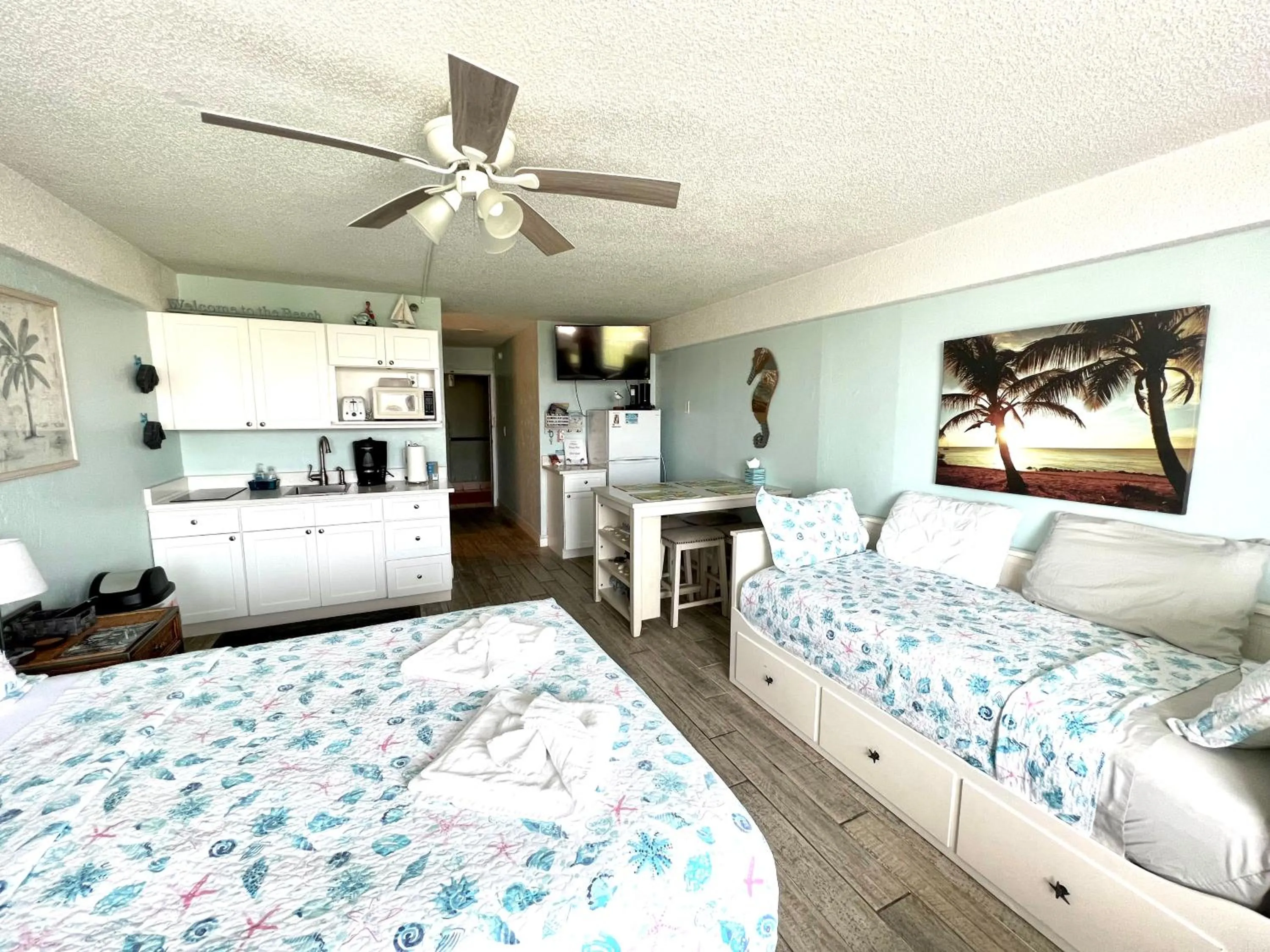 Bed in I Need A Vacay Now! Remodeled Studio