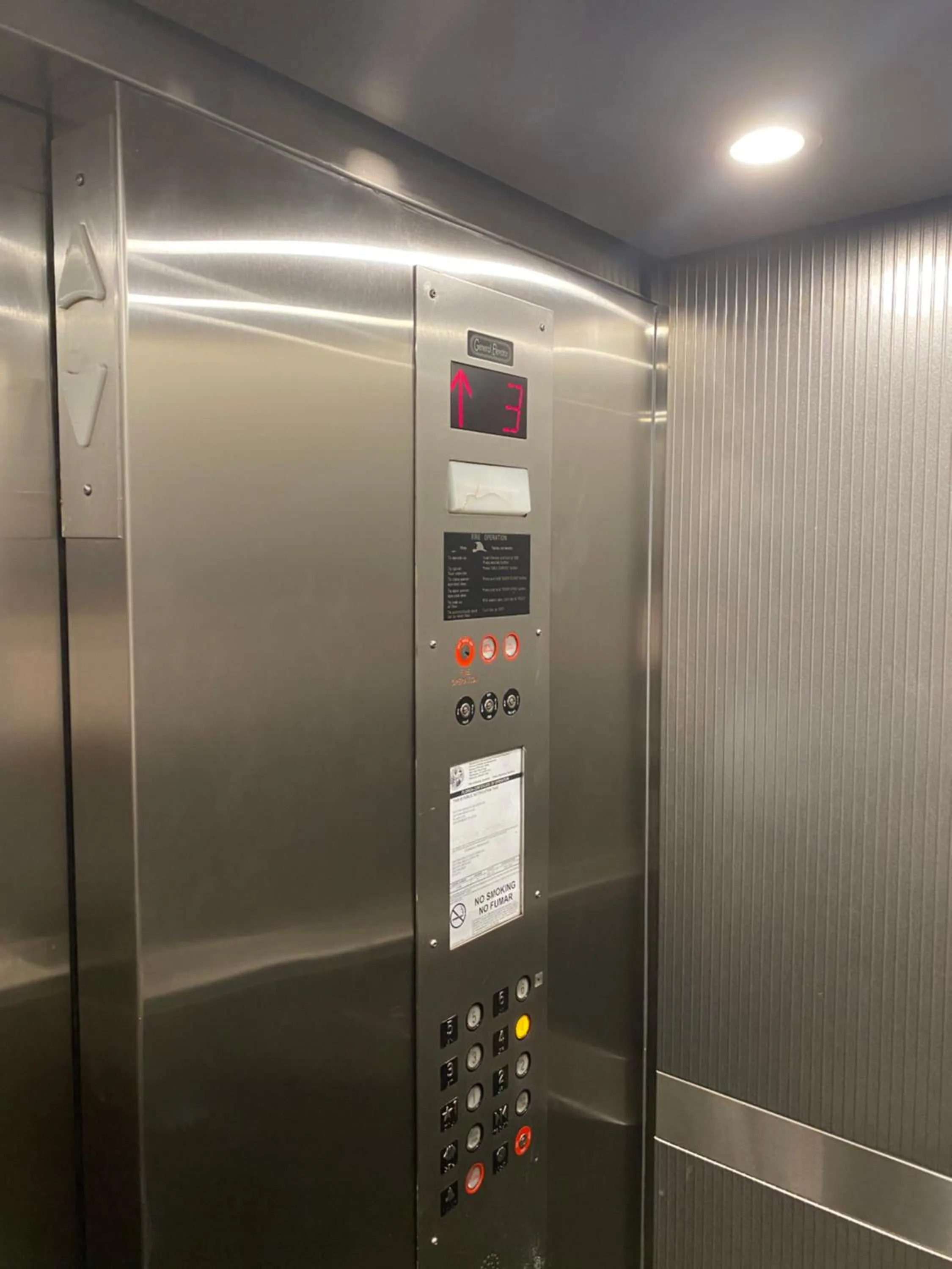 elevator in I Need A Vacay Now! Remodeled Studio