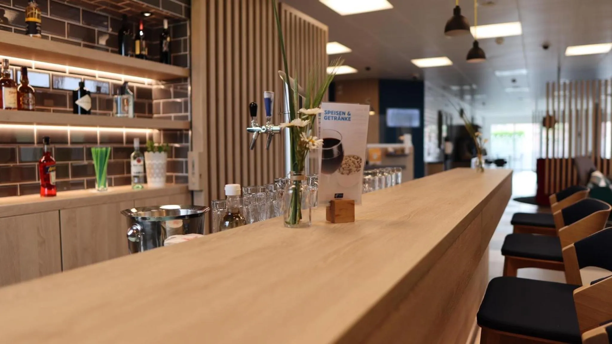 Lounge or bar in Holiday Inn Express Luzern-Neuenkirch by IHG