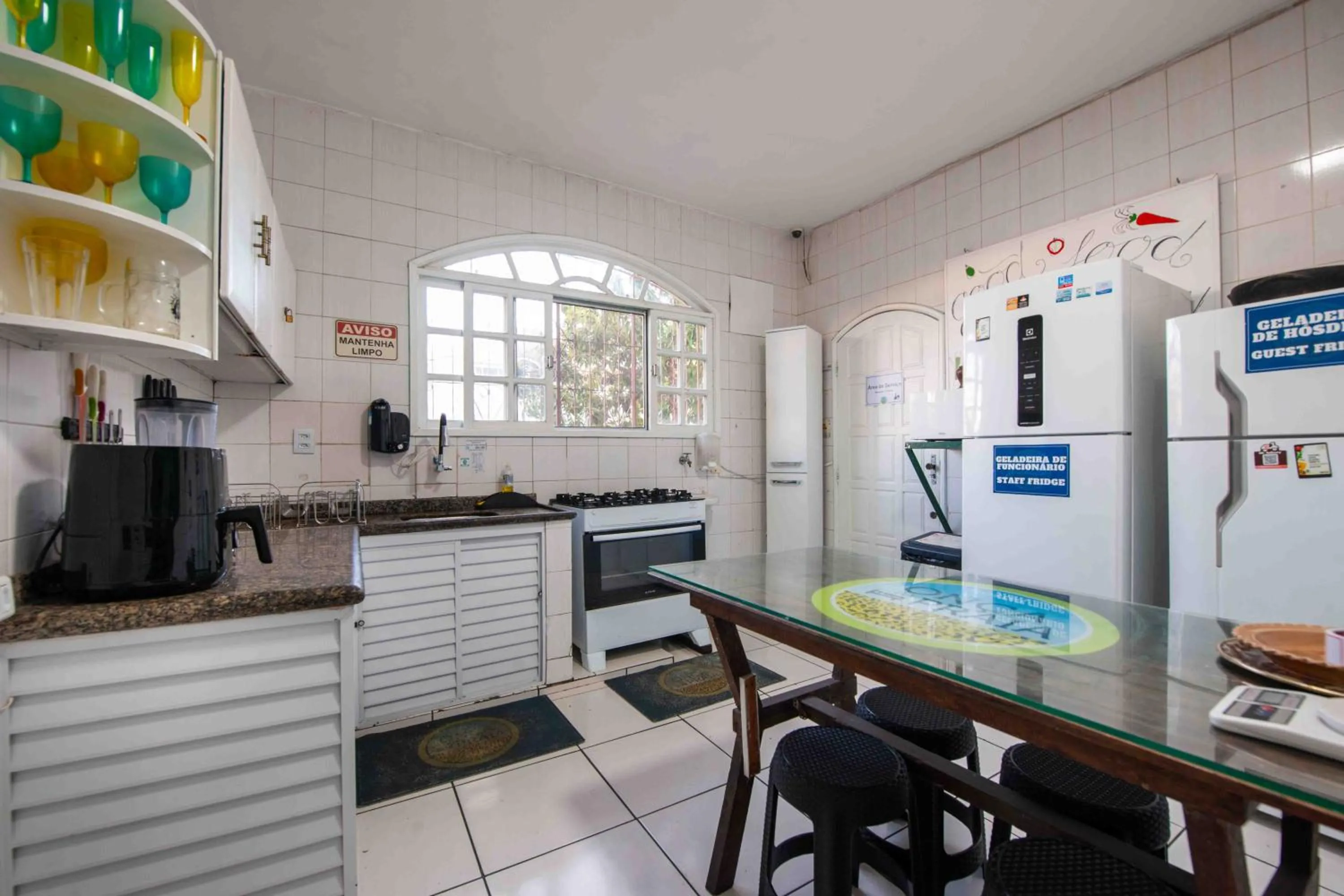 Kitchen or kitchenette in Onça da Praia Hostel
