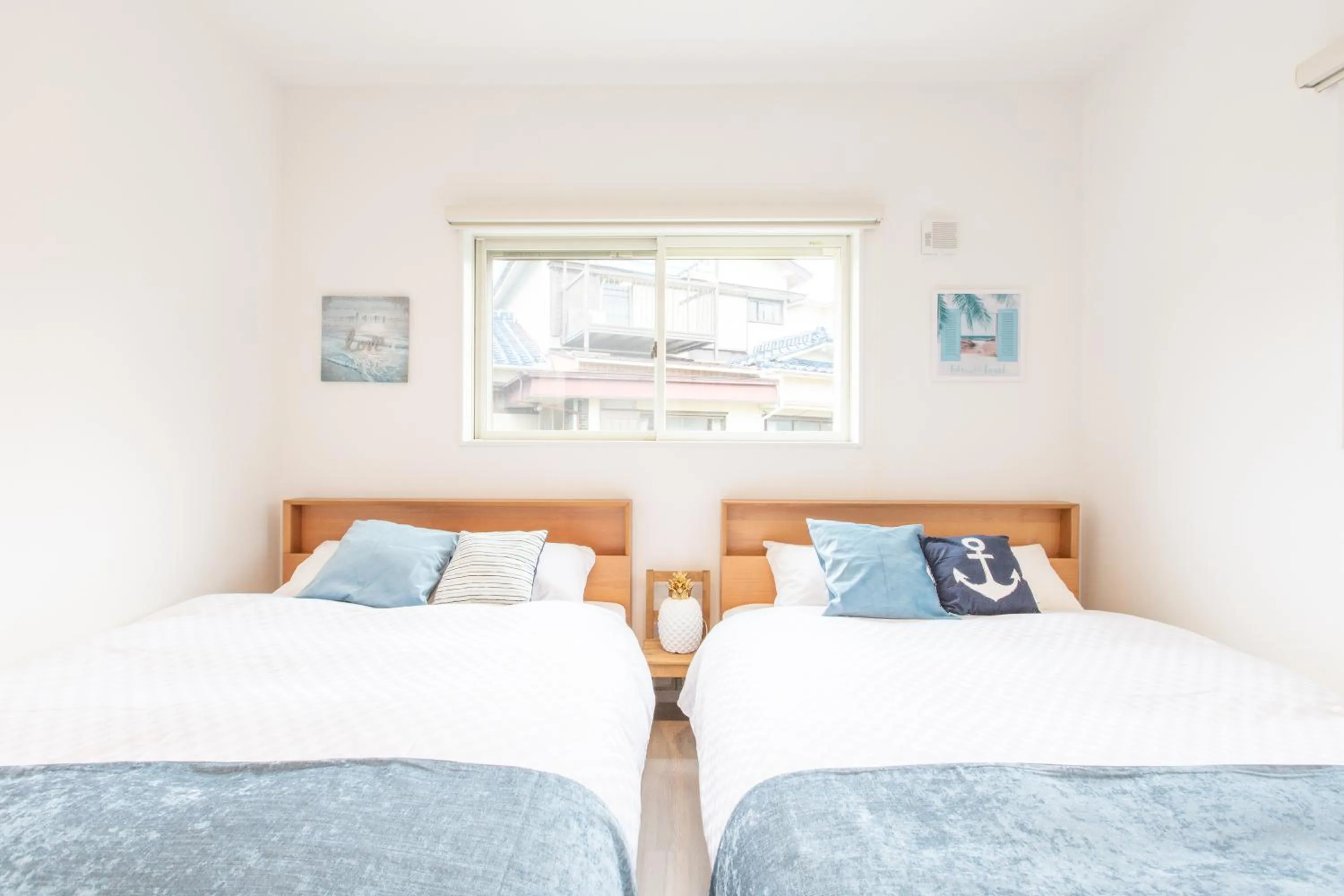 Bed in West Coast Villa Shirahama