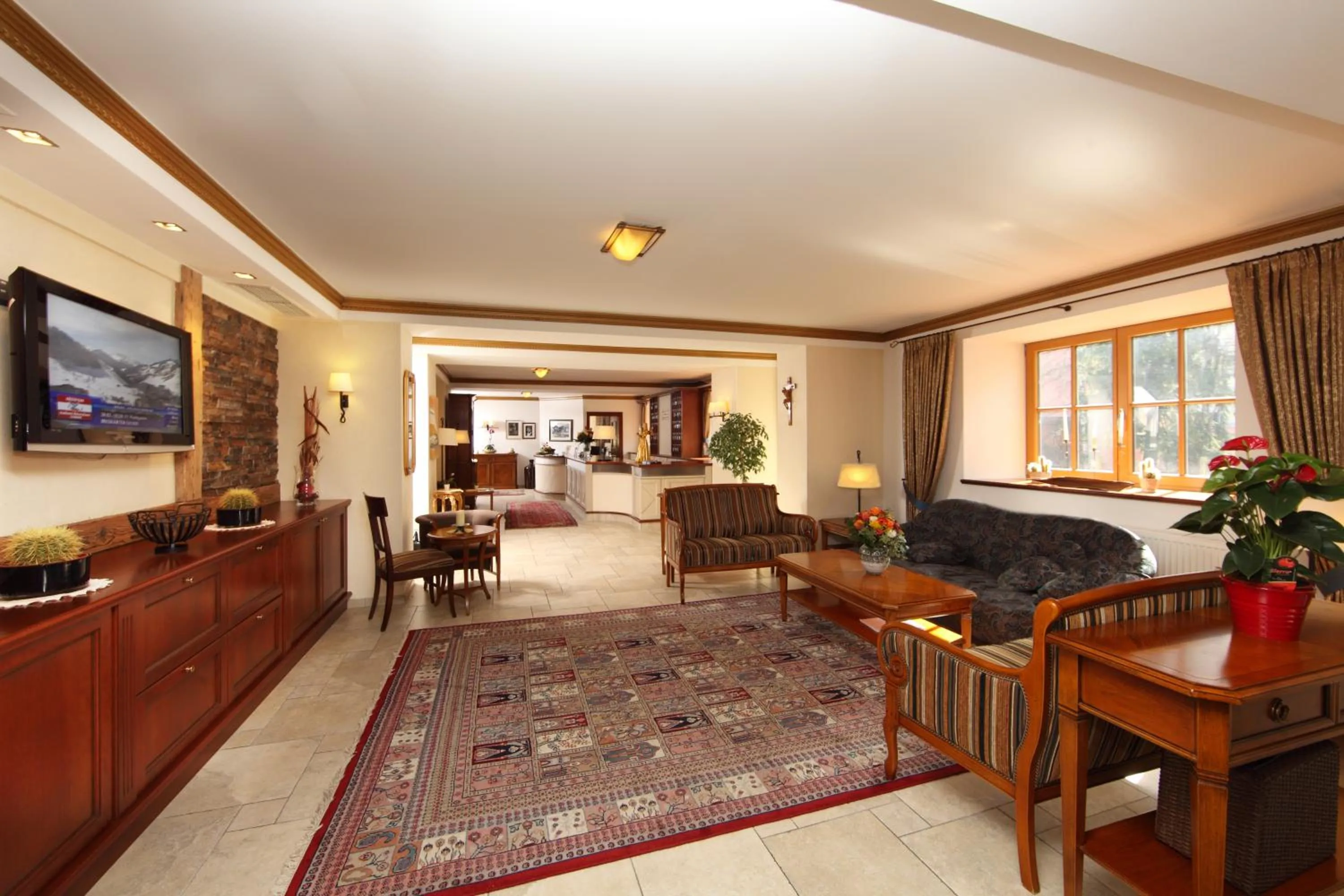 Communal lounge/ TV room in Hotel Unterwirt - Jokercard im Sommer inklusive