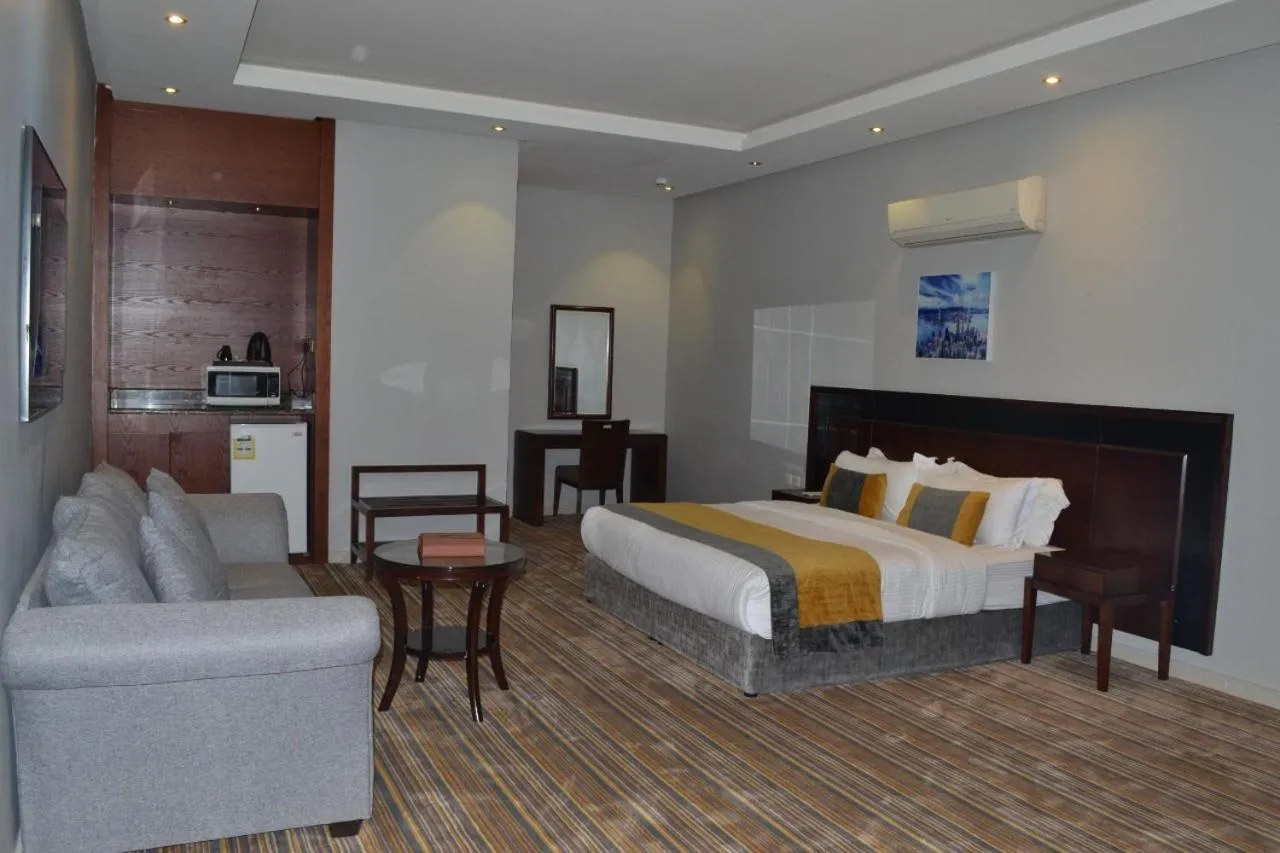 Bed in Taleen Serviced Apartments Granada