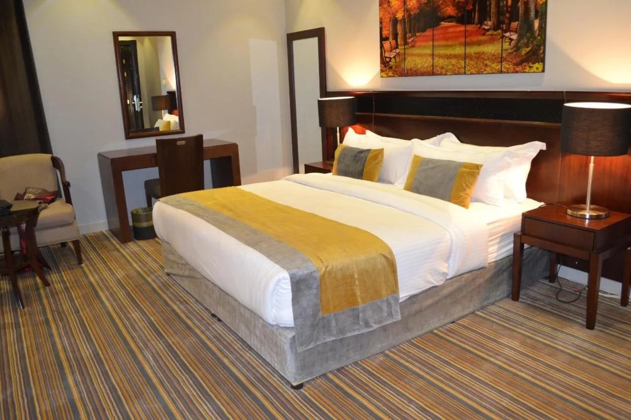 Bed in Taleen Serviced Apartments Granada