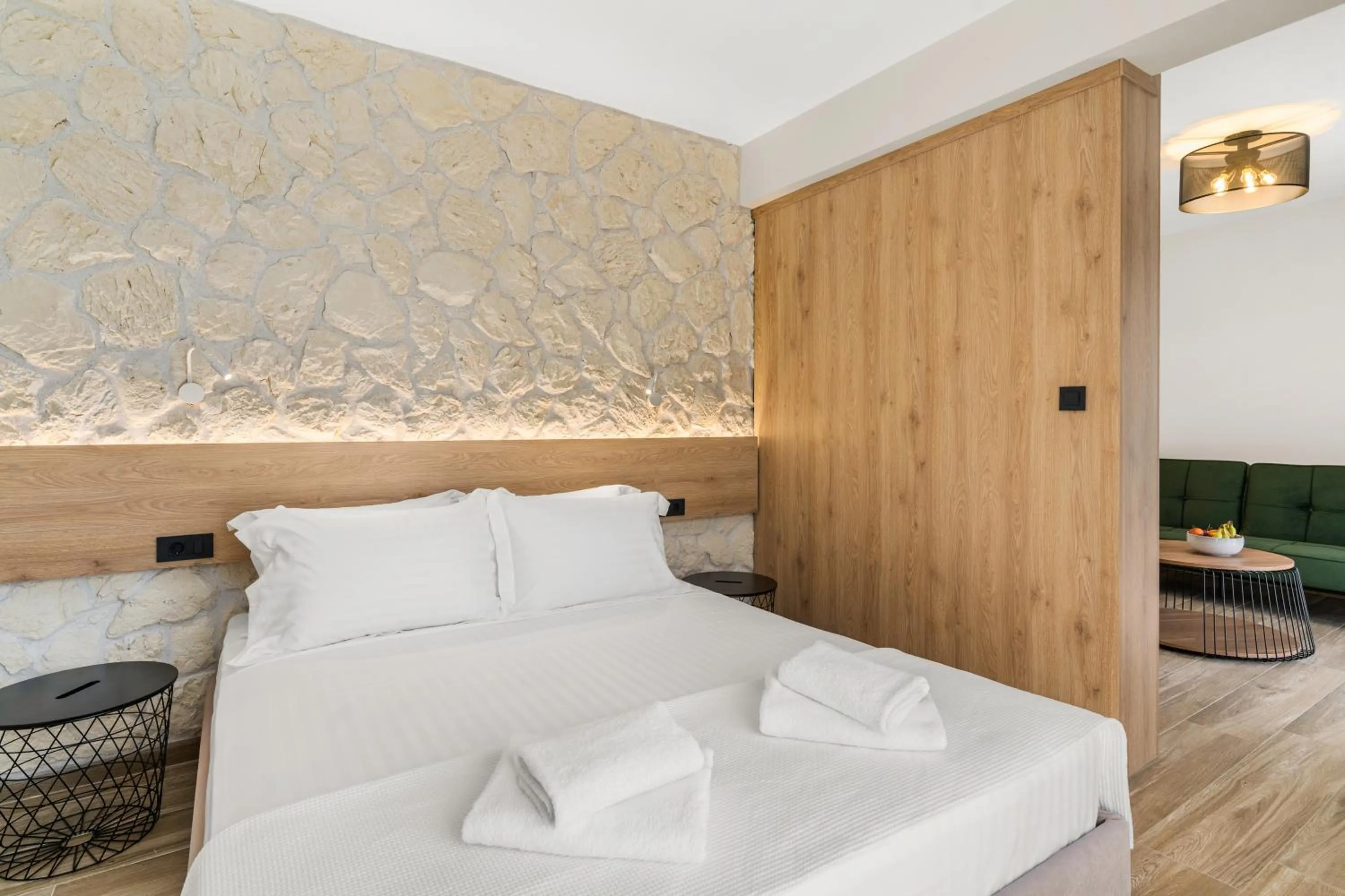 Bed in Sigma Luxury Rooms