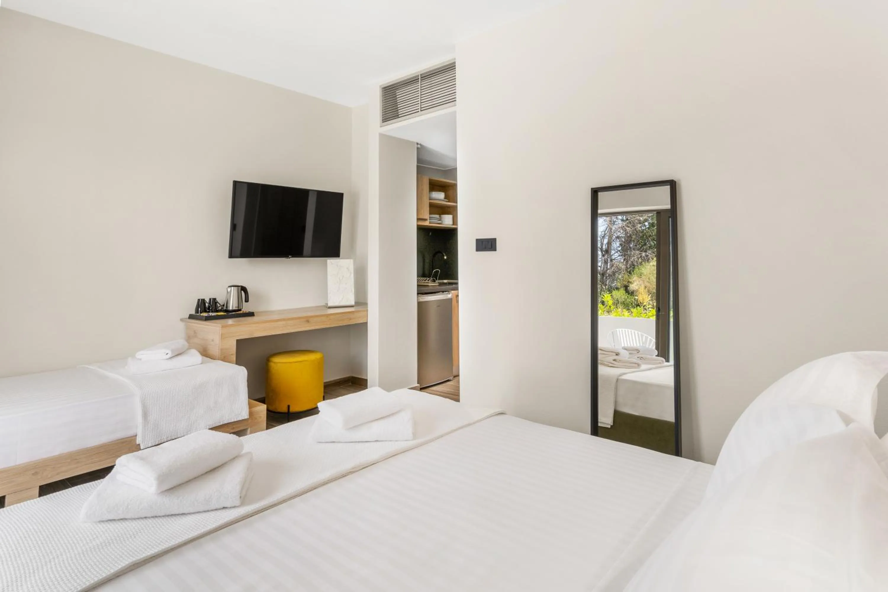 Bed in Sigma Luxury Rooms