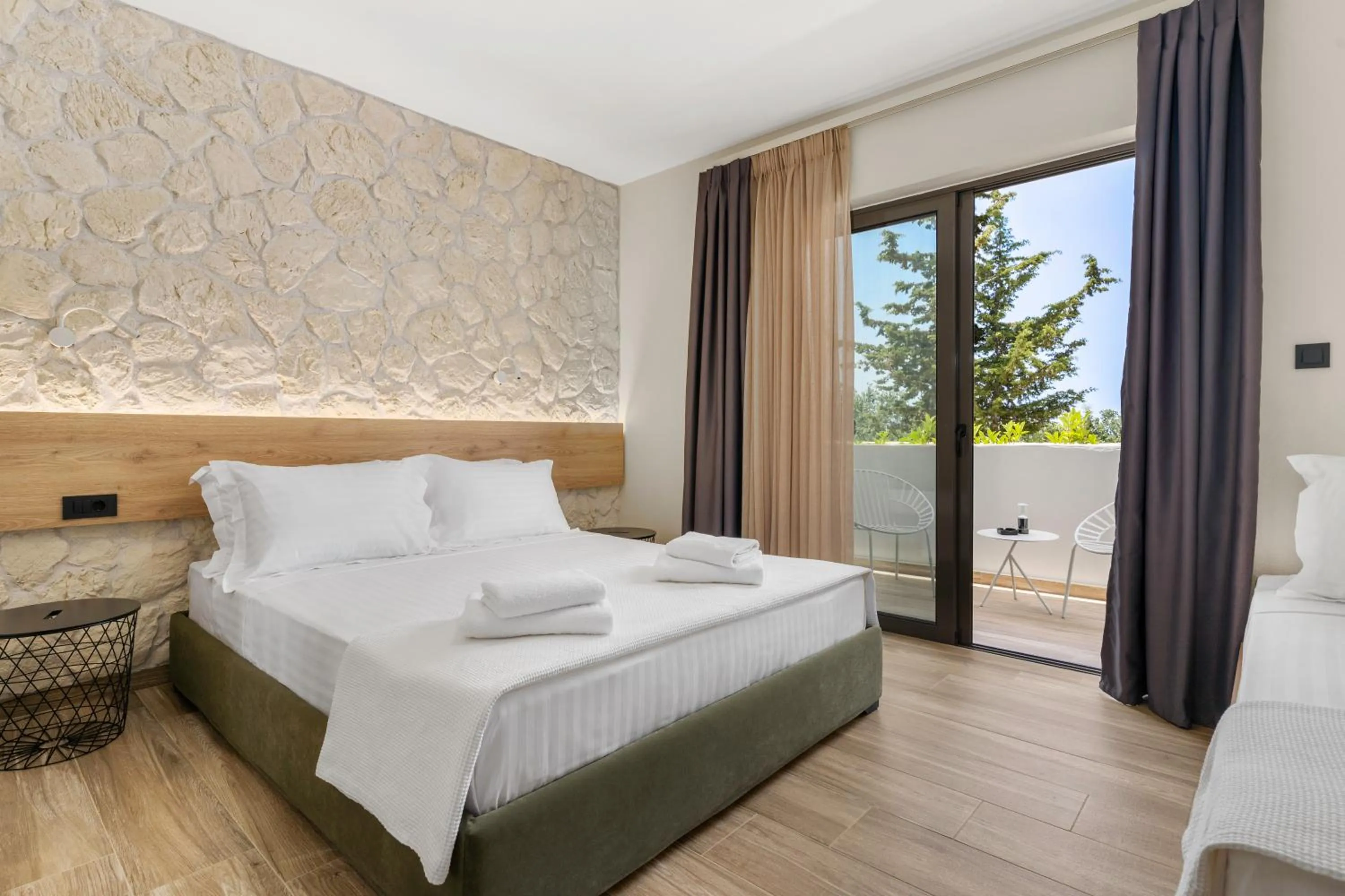 Bed in Sigma Luxury Rooms