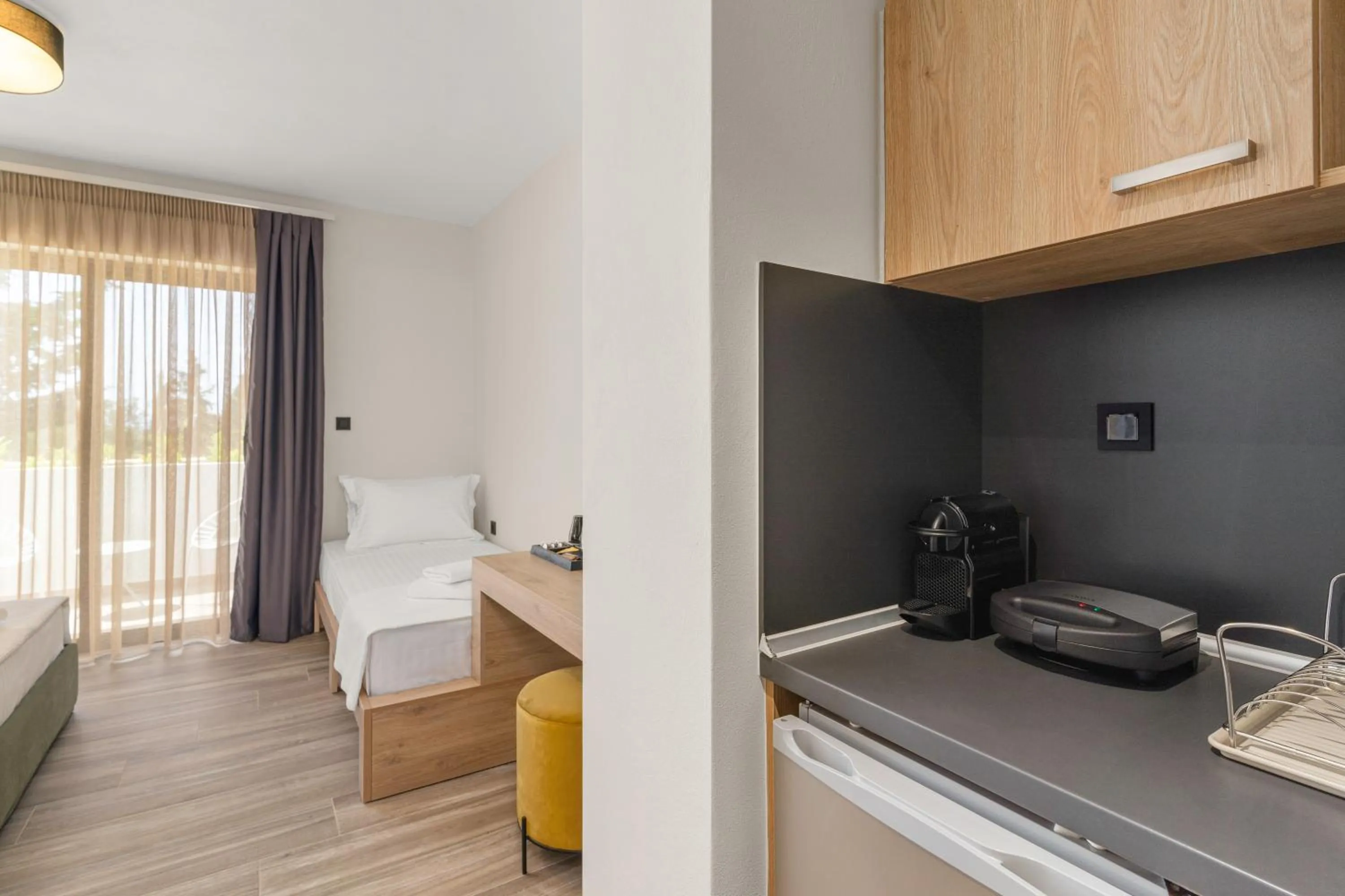 Bed in Sigma Luxury Rooms