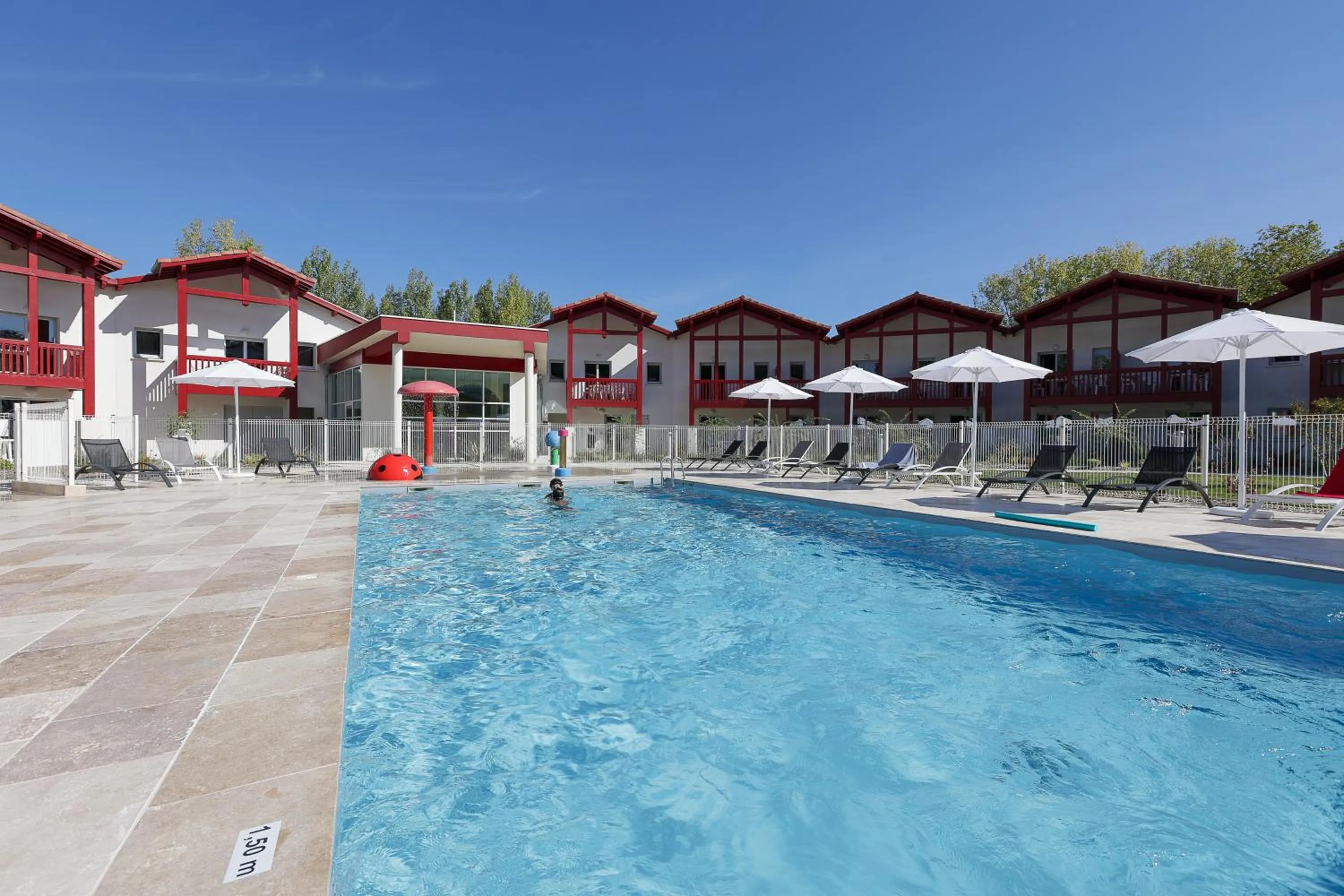 Swimming pool in Résidence Néméa Le Domaine d'Uhaina