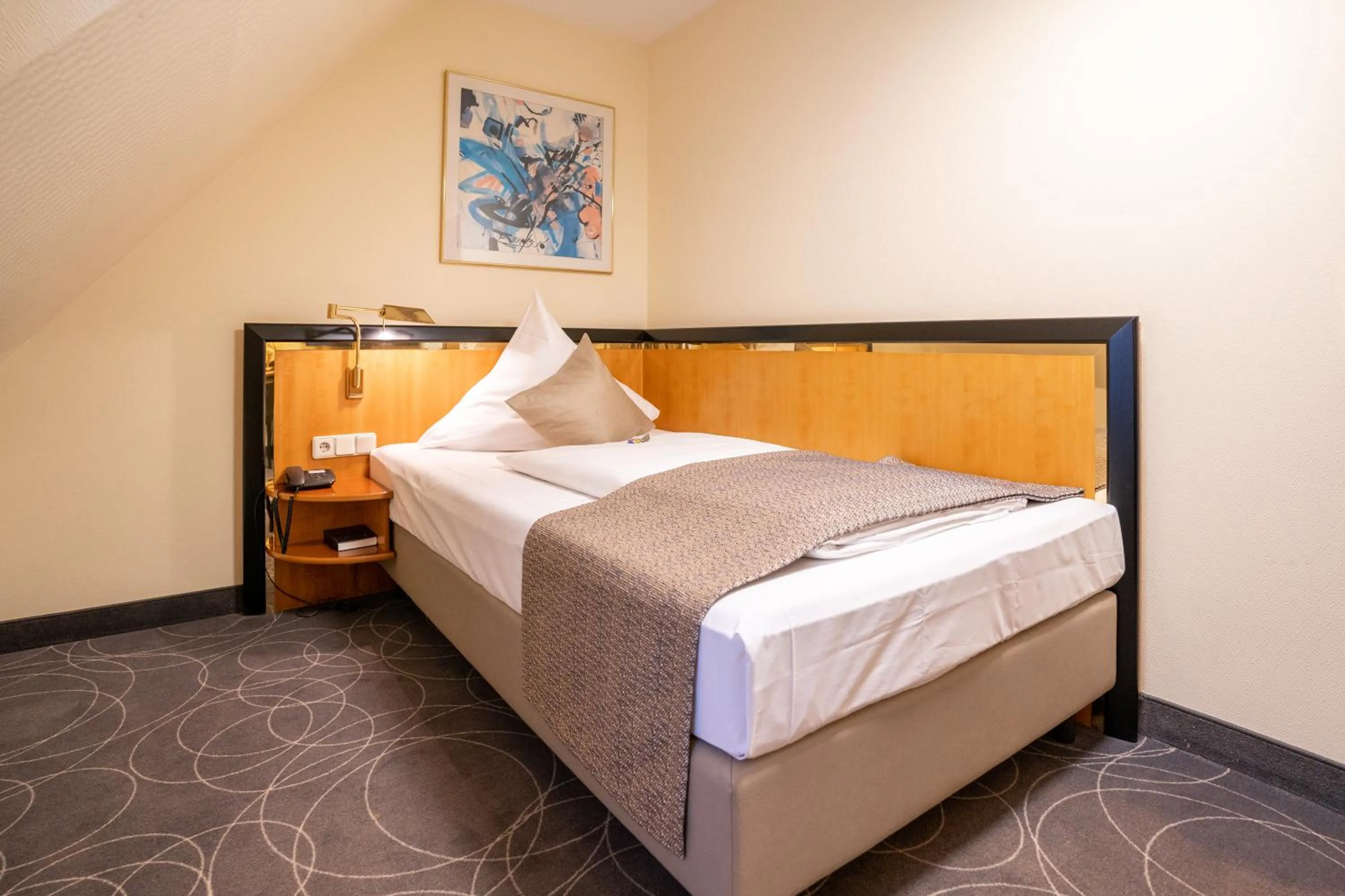 Bed in Hotel am Stadtgarten