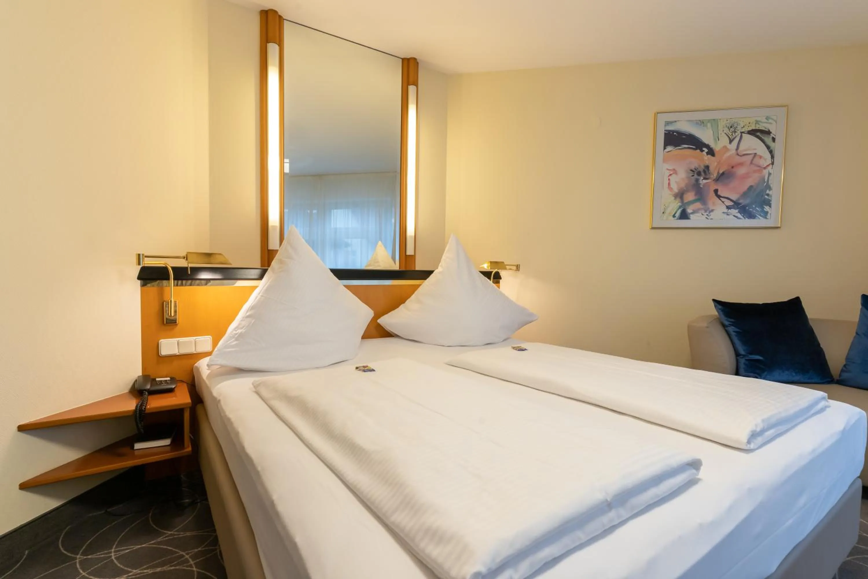 Bed in Hotel am Stadtgarten