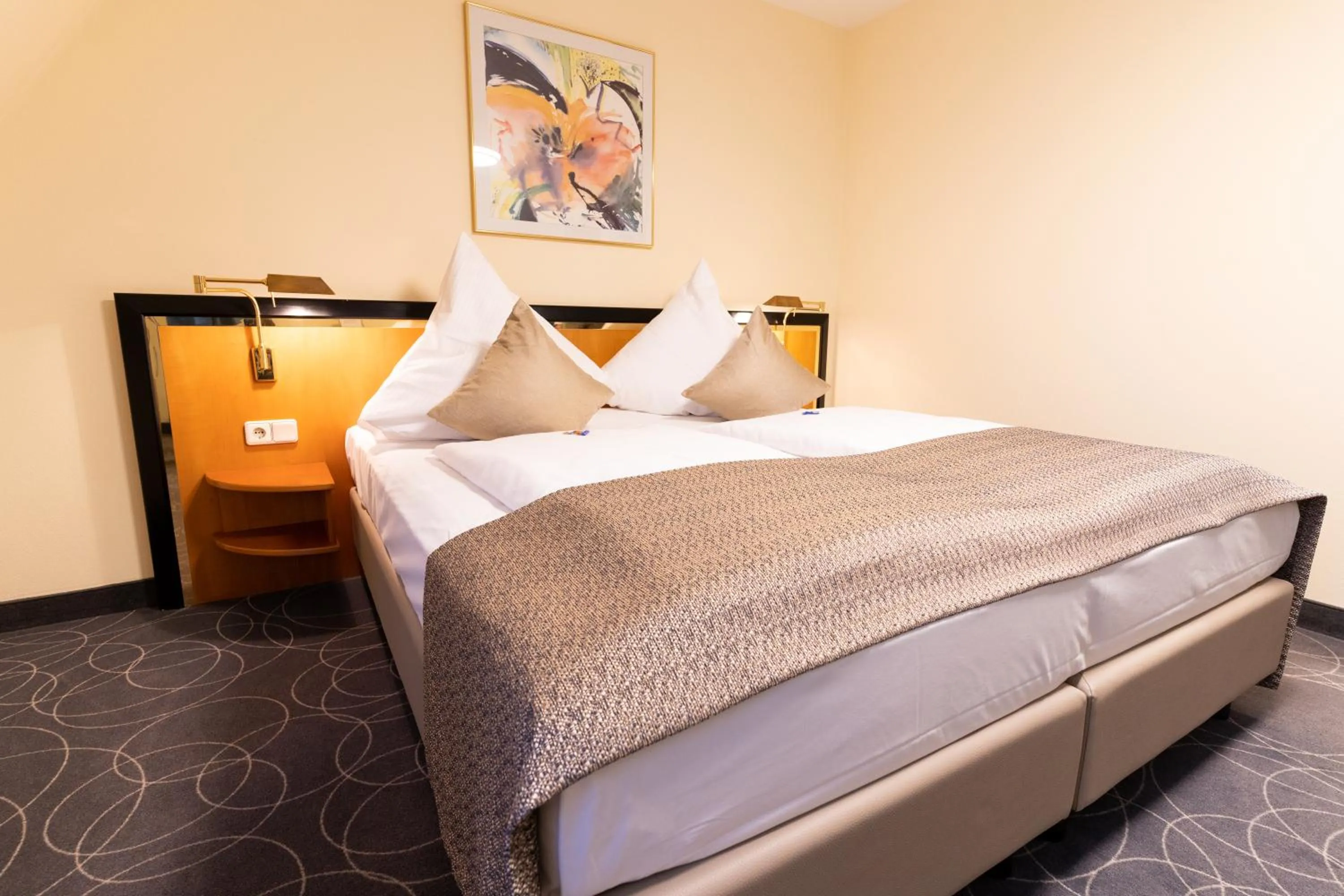 Bed in Hotel am Stadtgarten