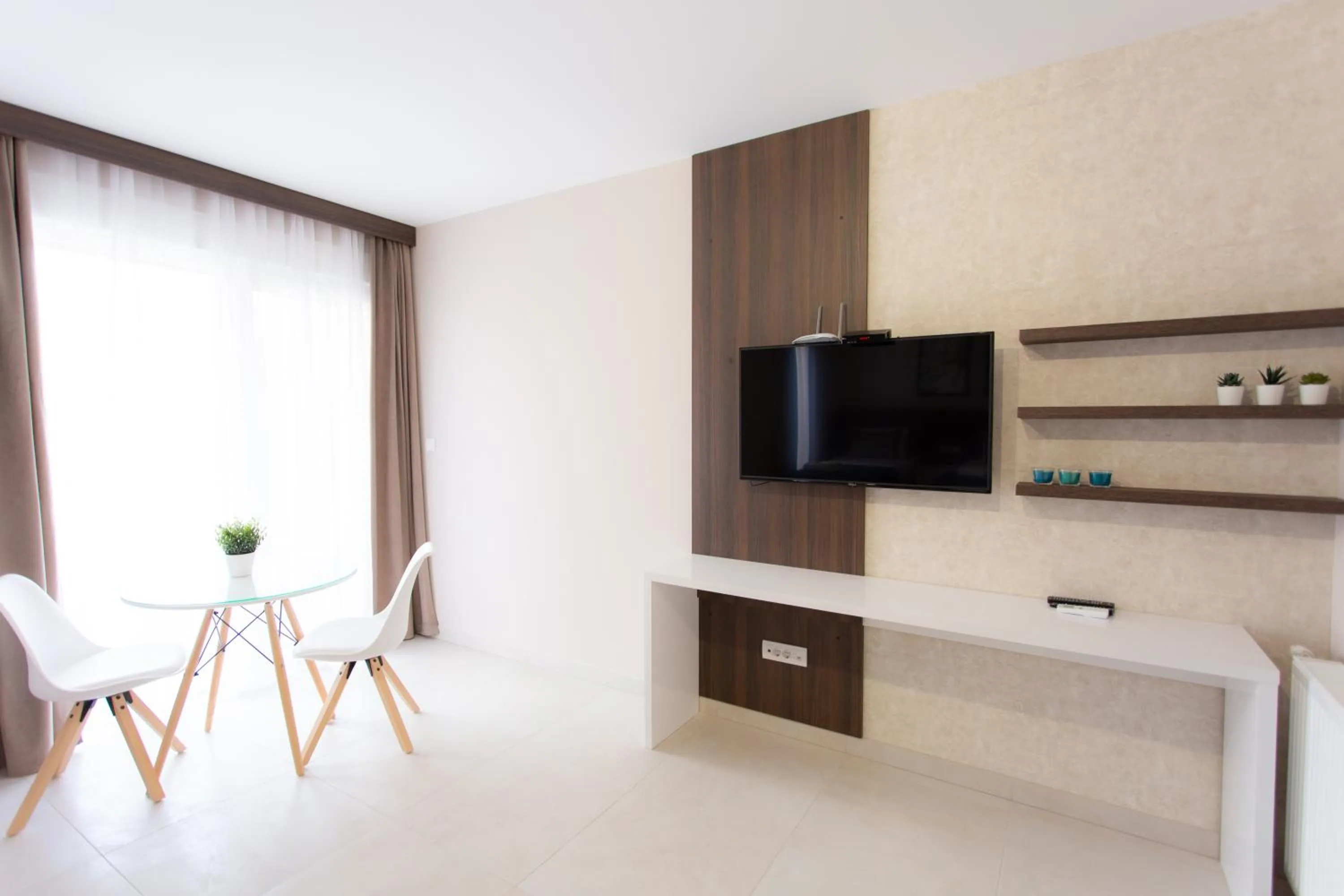 Communal lounge/ TV room in Villa BonnaDea