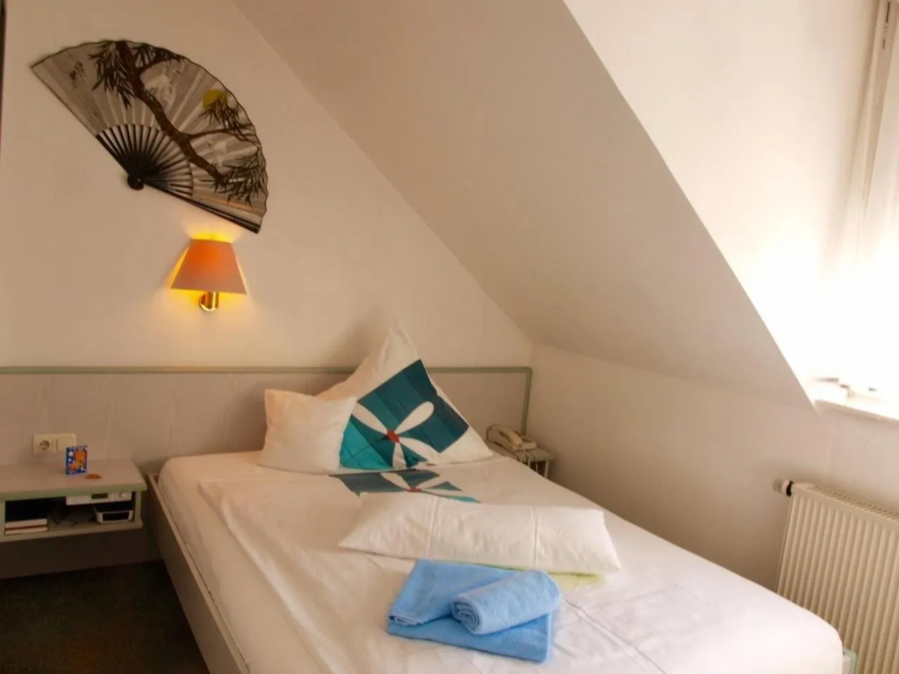 Photo of the whole room, Bed in Landgasthaus Bonn