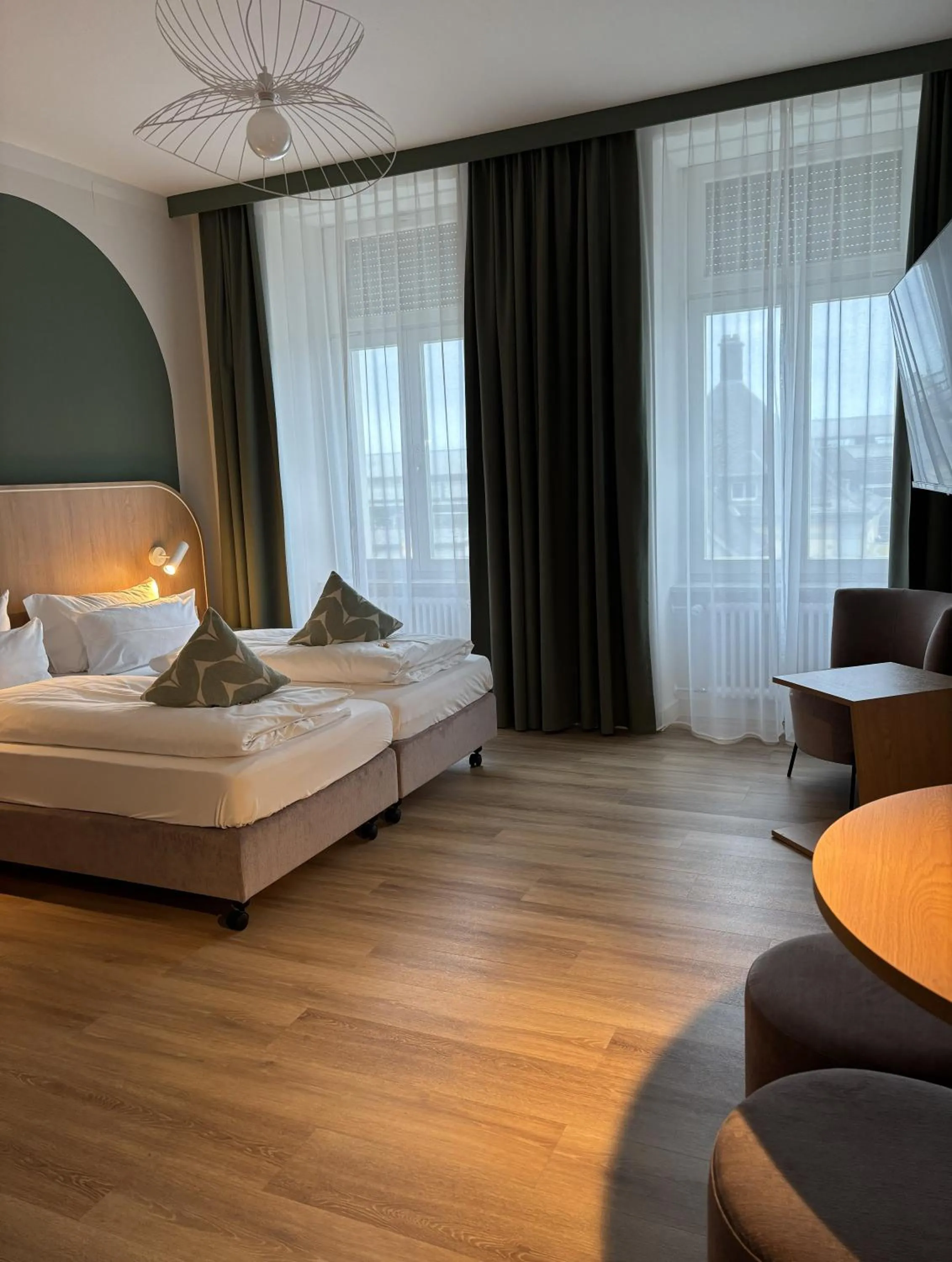 TV and multimedia, Bed in Gästehaus Centro in Konstanz