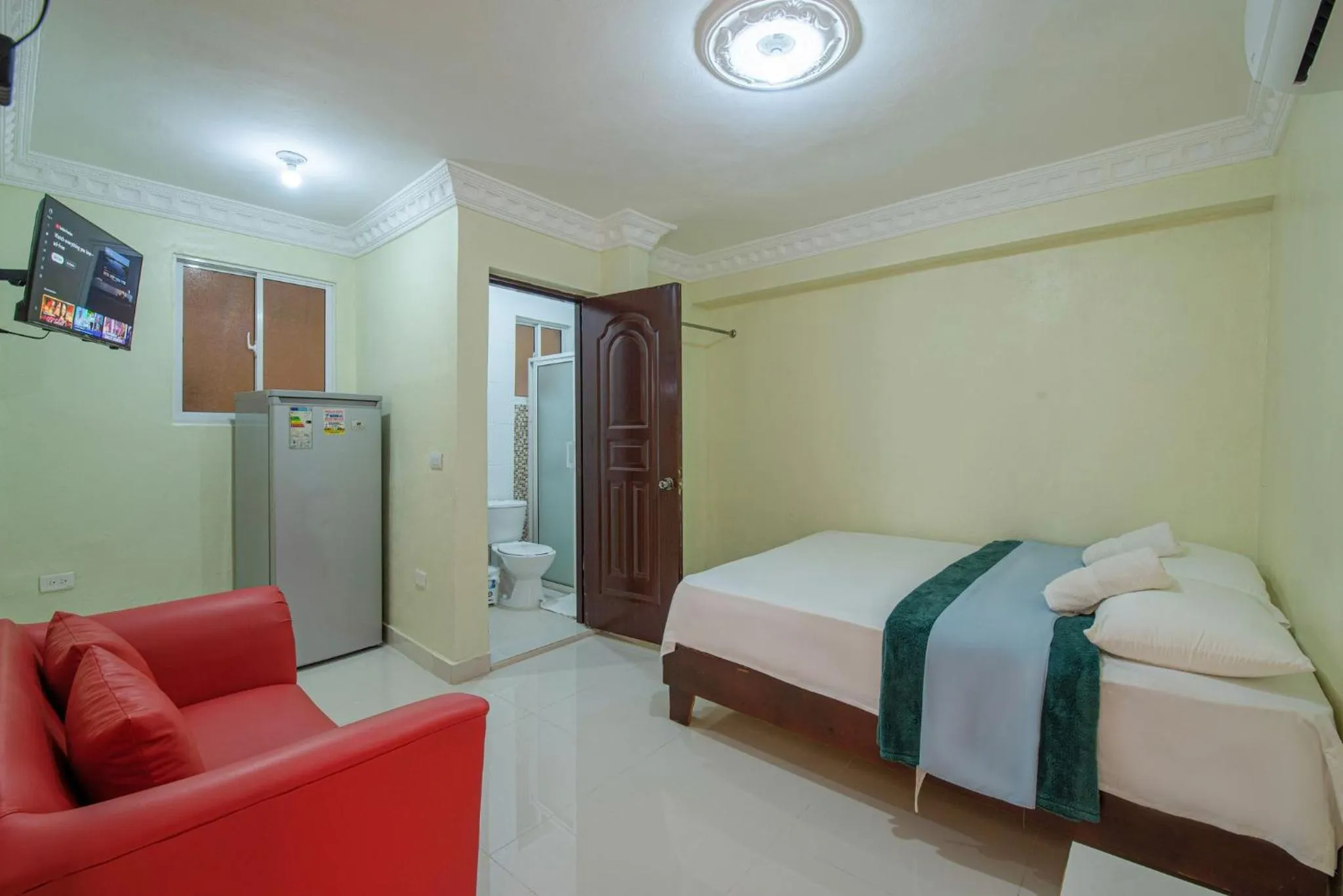 Toilet, Bed in Tropical Island Apartahotel