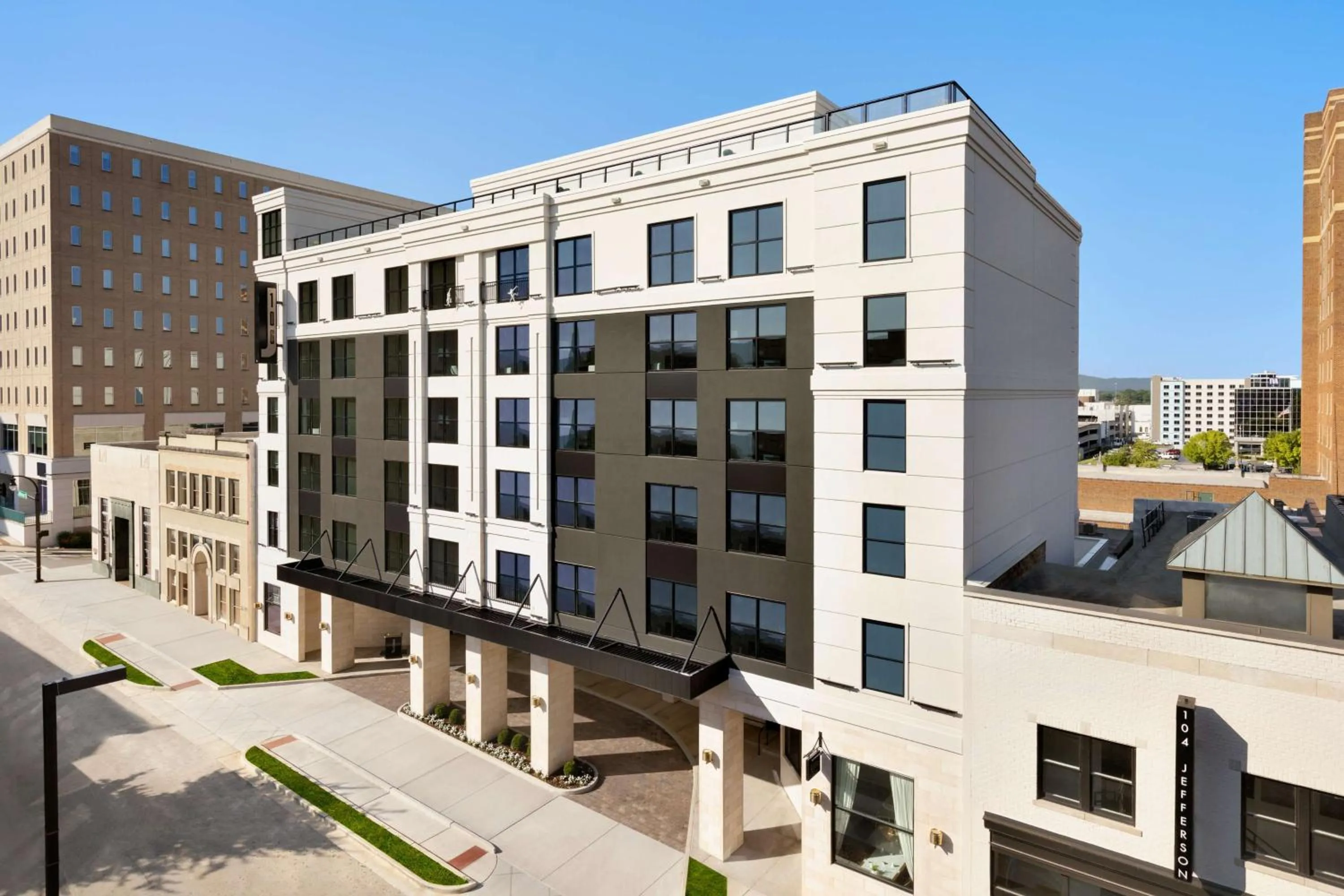 Property building in 106 Jefferson Huntsville, Curio Collection by Hilton