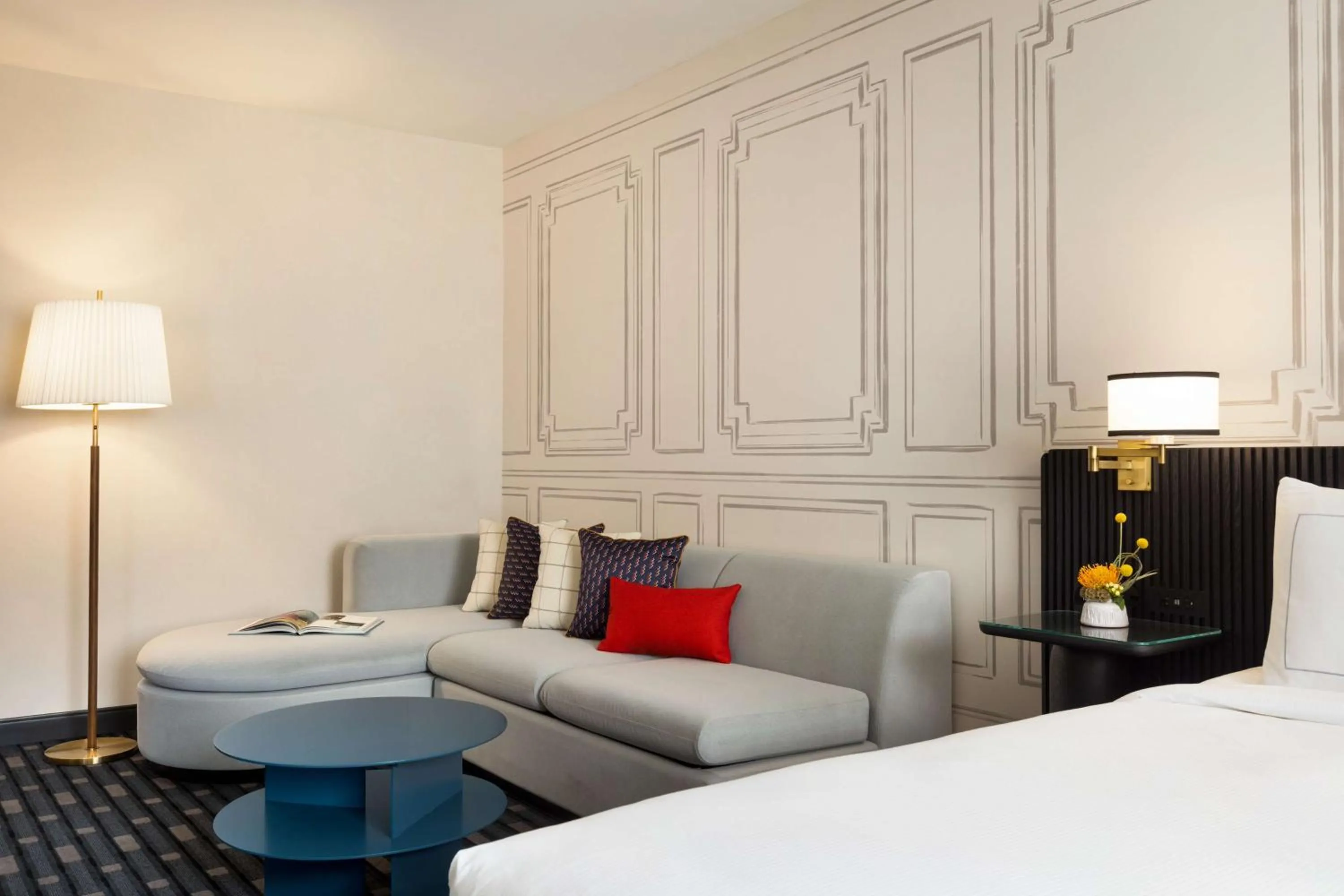 Living room, Bed in 106 Jefferson Huntsville, Curio Collection by Hilton