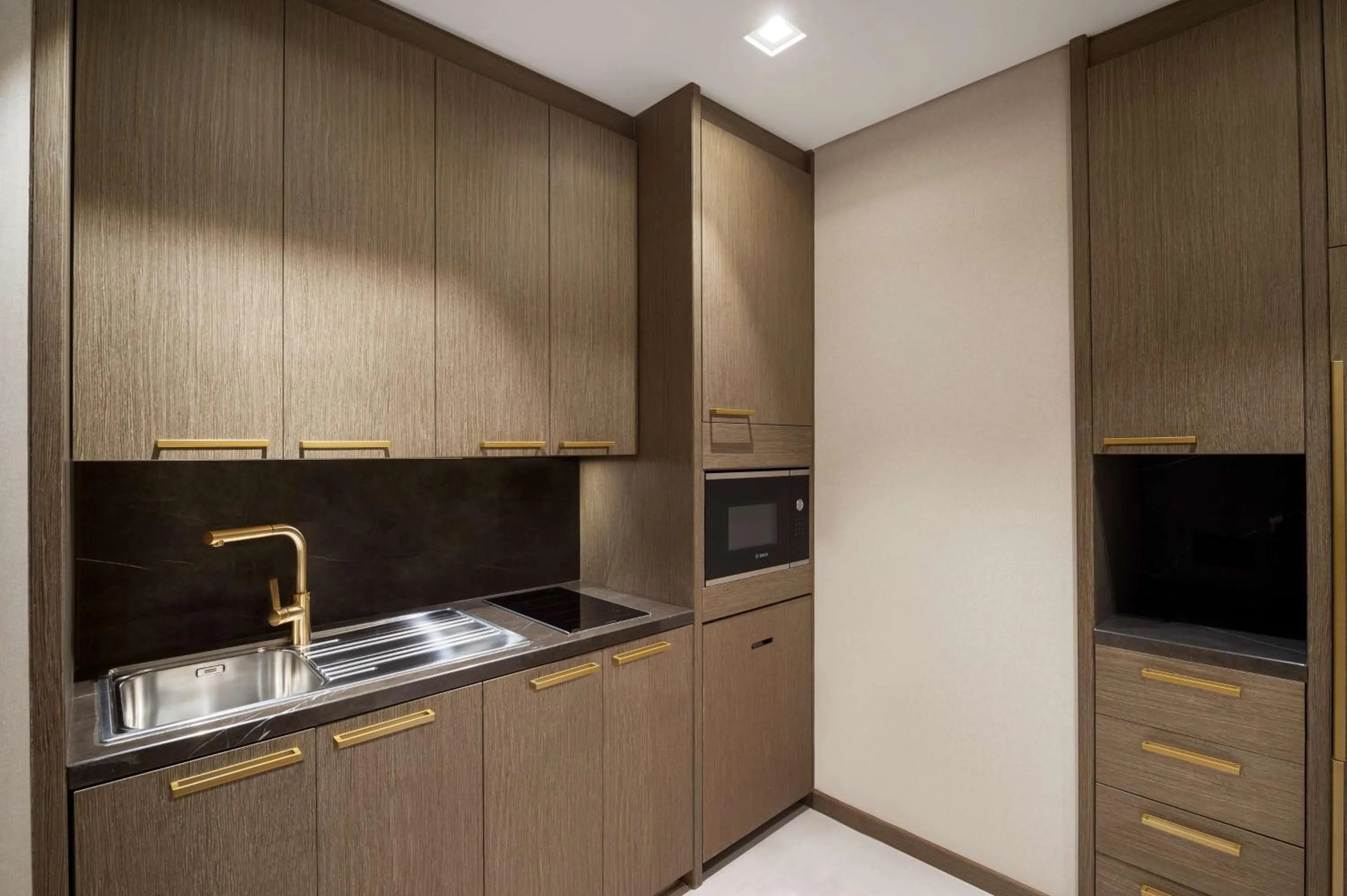 Kitchen or kitchenette in Waldorf Astoria Kuwait