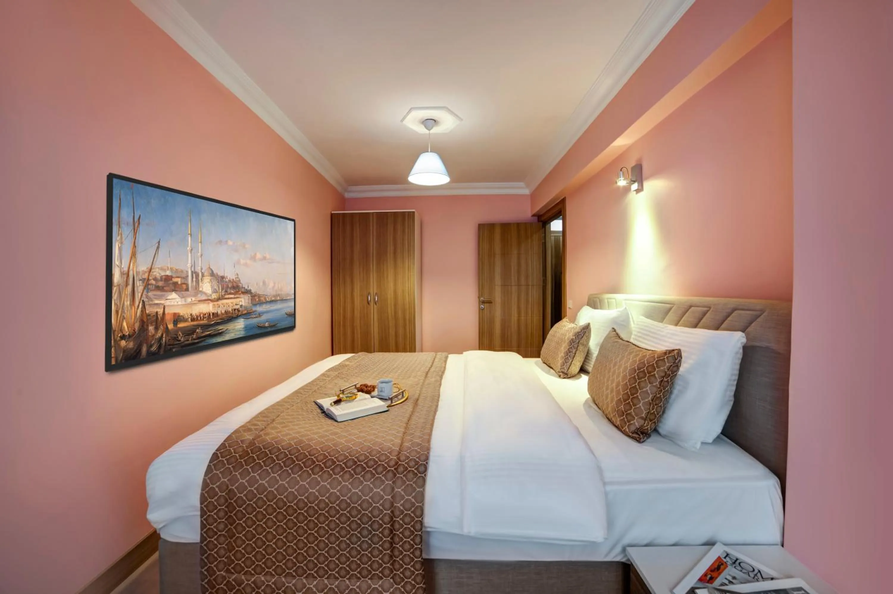 Bed in SEVEN ROSES APART HOTEL