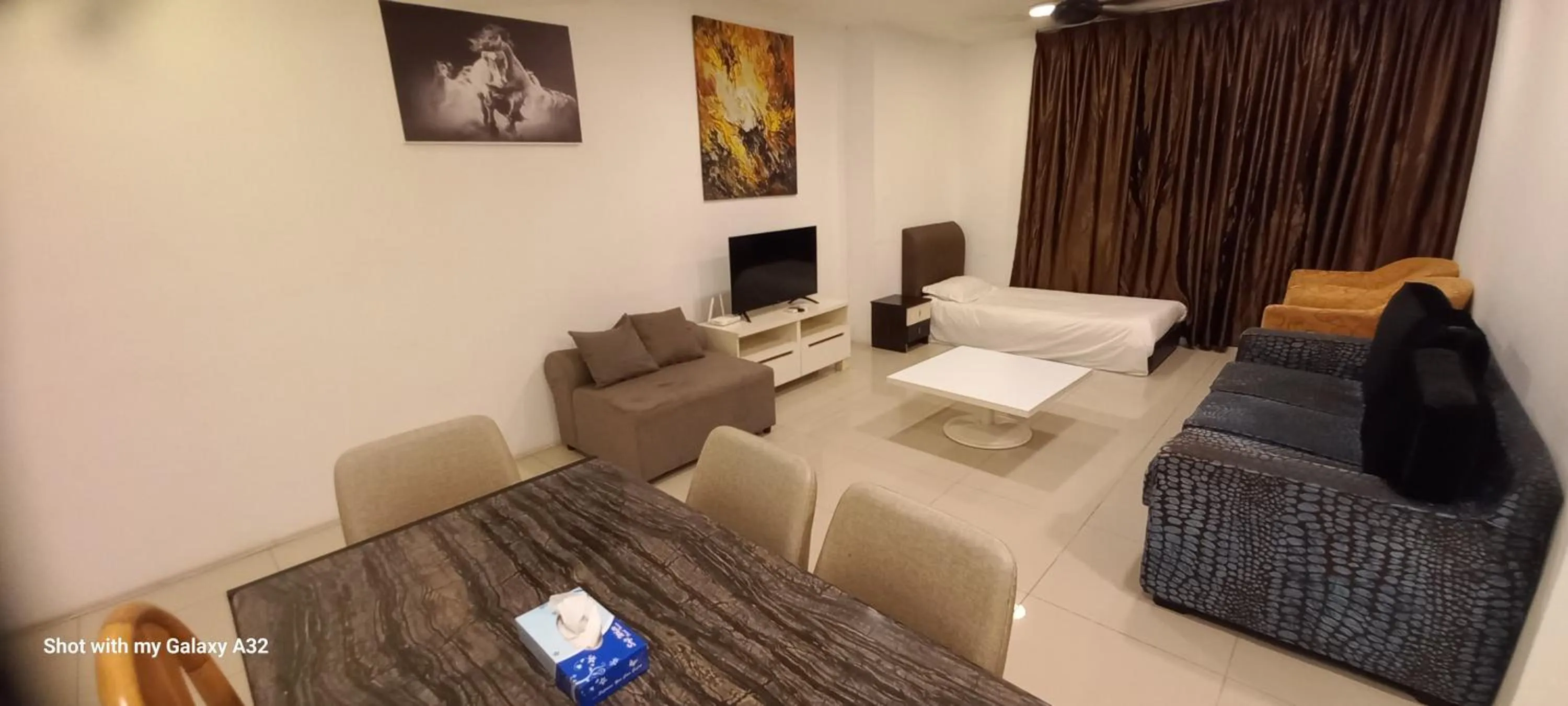 Living room in One Maxim Residence at Taragon