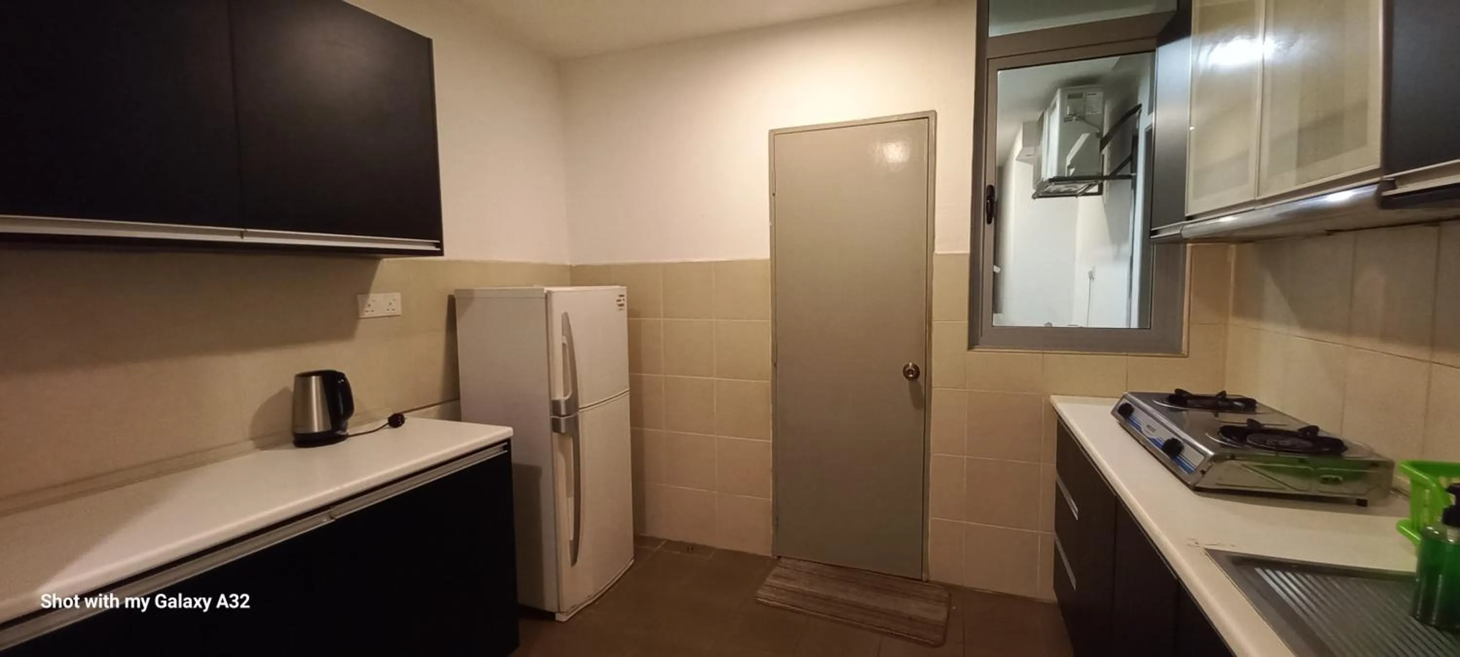 Kitchen or kitchenette in One Maxim Residence at Taragon