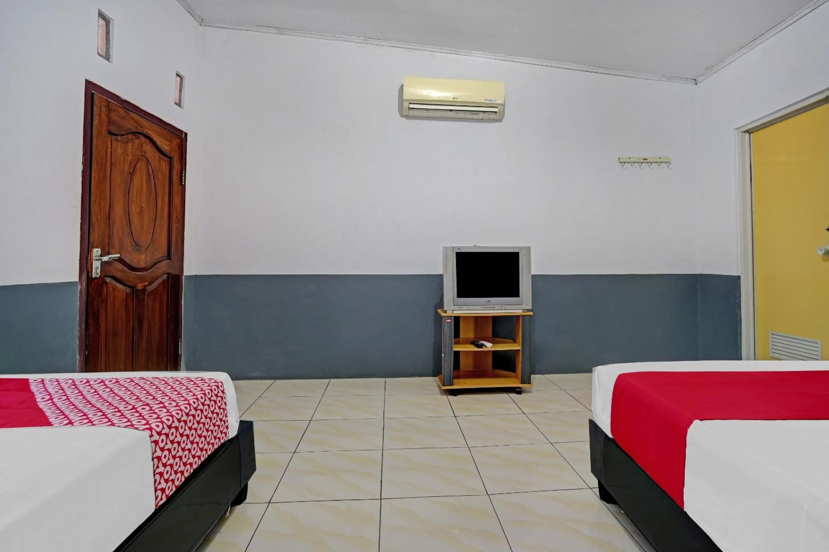 Bedroom in OYO 90405 Penginapan Sasti Kuningan