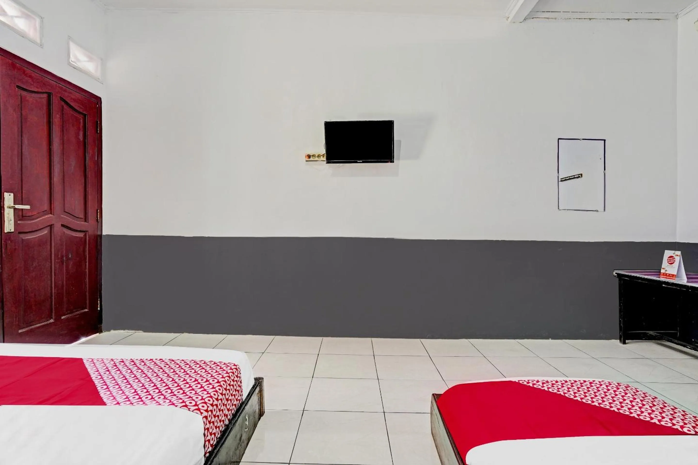 Bedroom in OYO 90405 Penginapan Sasti Kuningan