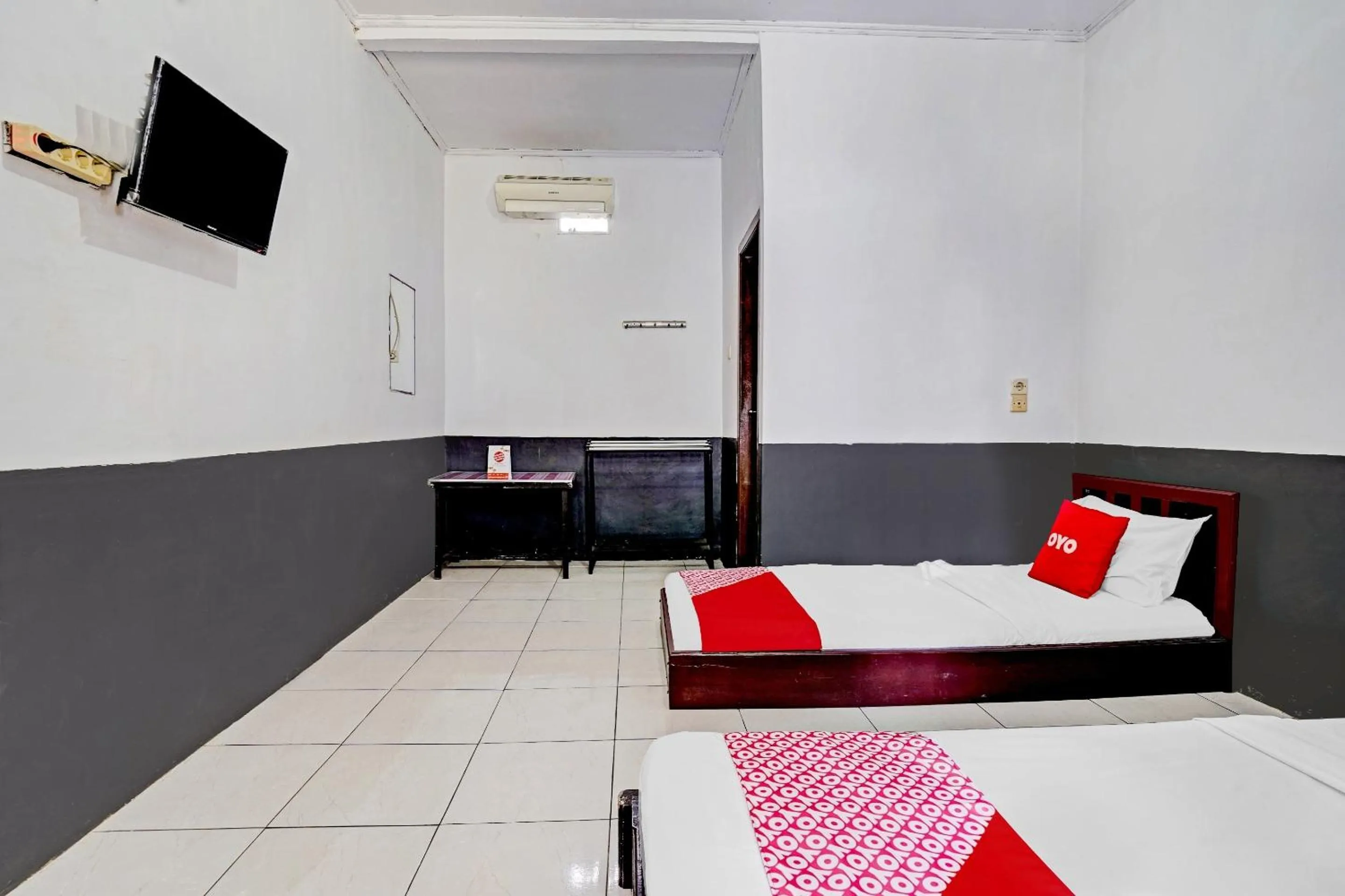 Bedroom in OYO 90405 Penginapan Sasti Kuningan