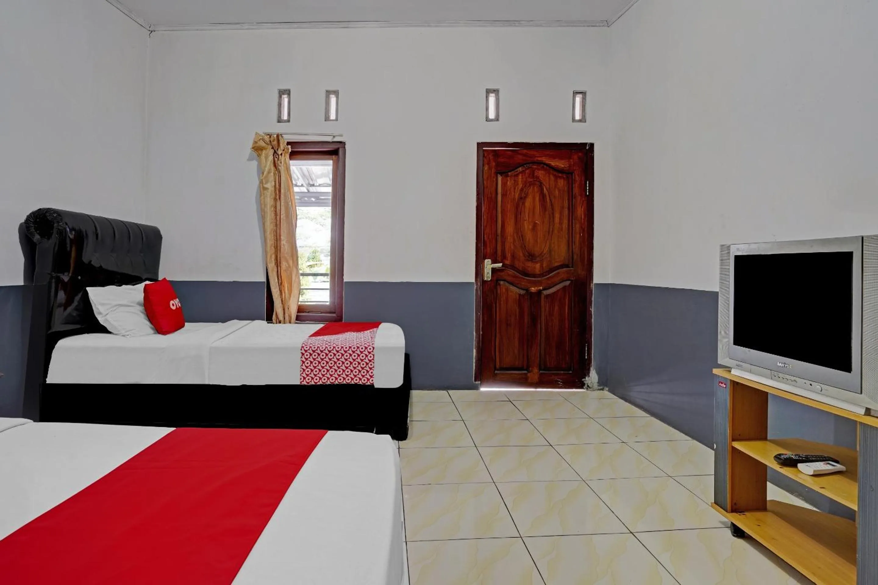 Bedroom in OYO 90405 Penginapan Sasti Kuningan