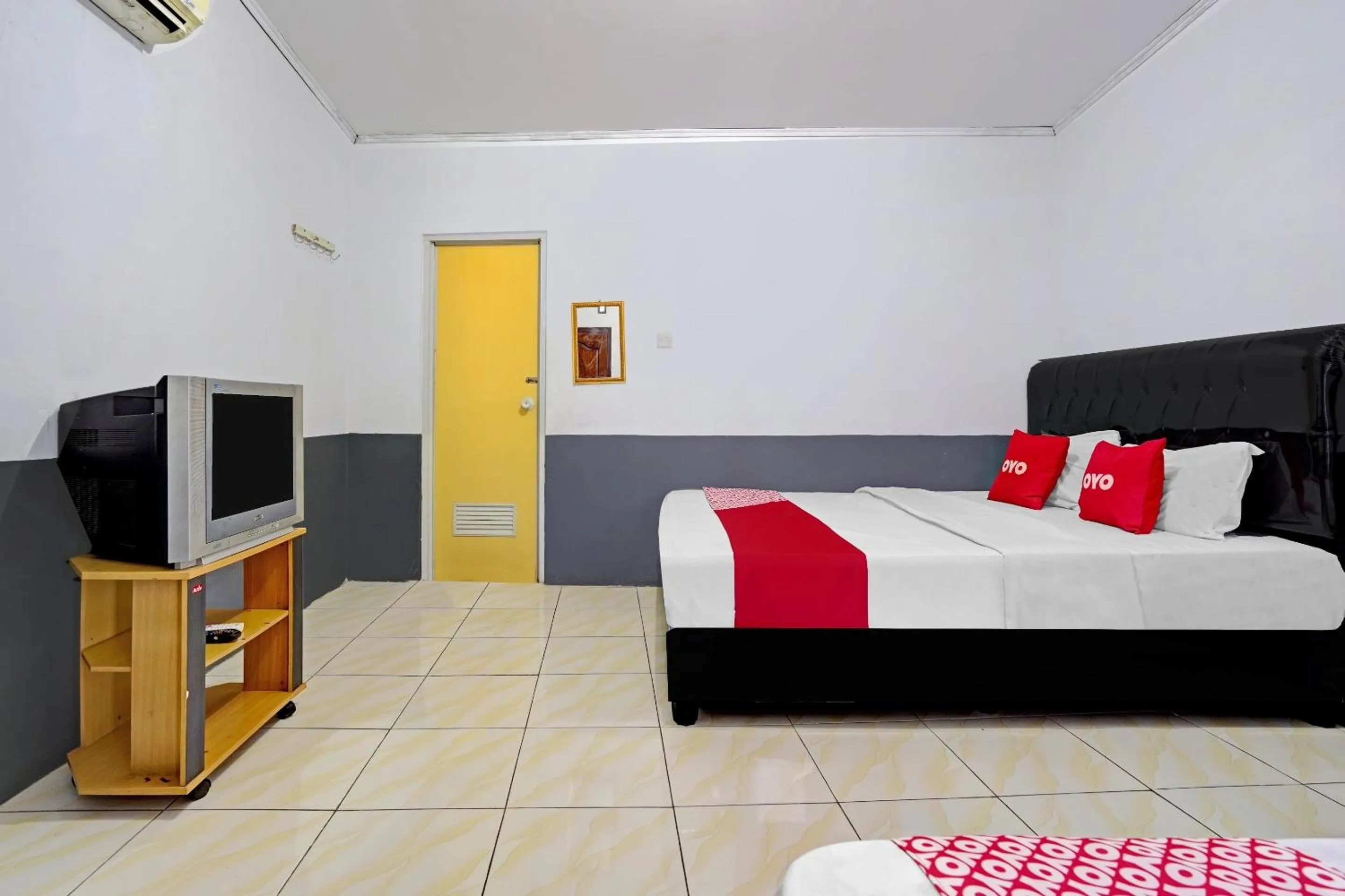 Bedroom in OYO 90405 Penginapan Sasti Kuningan