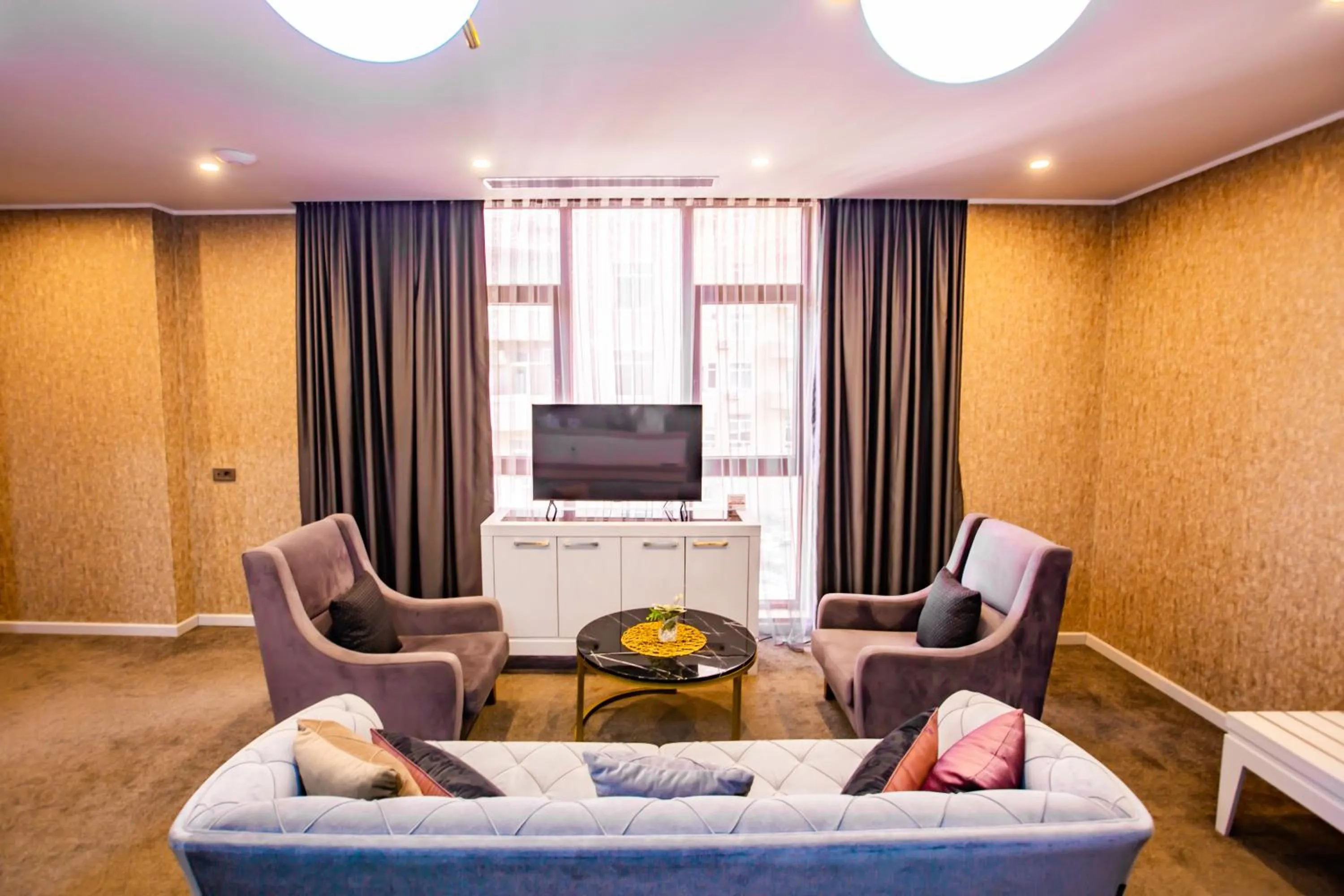 Communal lounge/ TV room in Premium Park Hotel