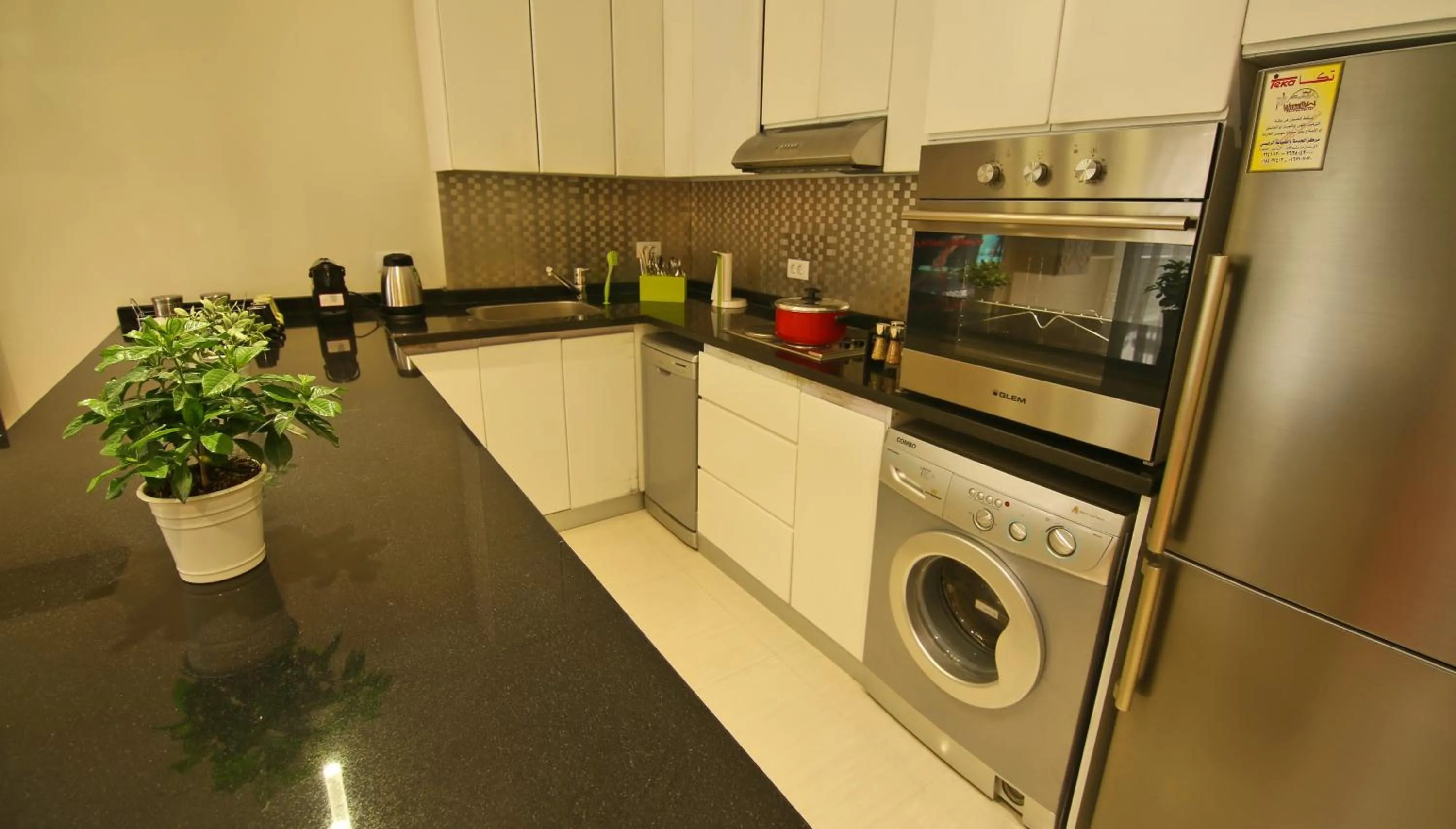 Kitchen or kitchenette in AlAshrafia Smart Residence