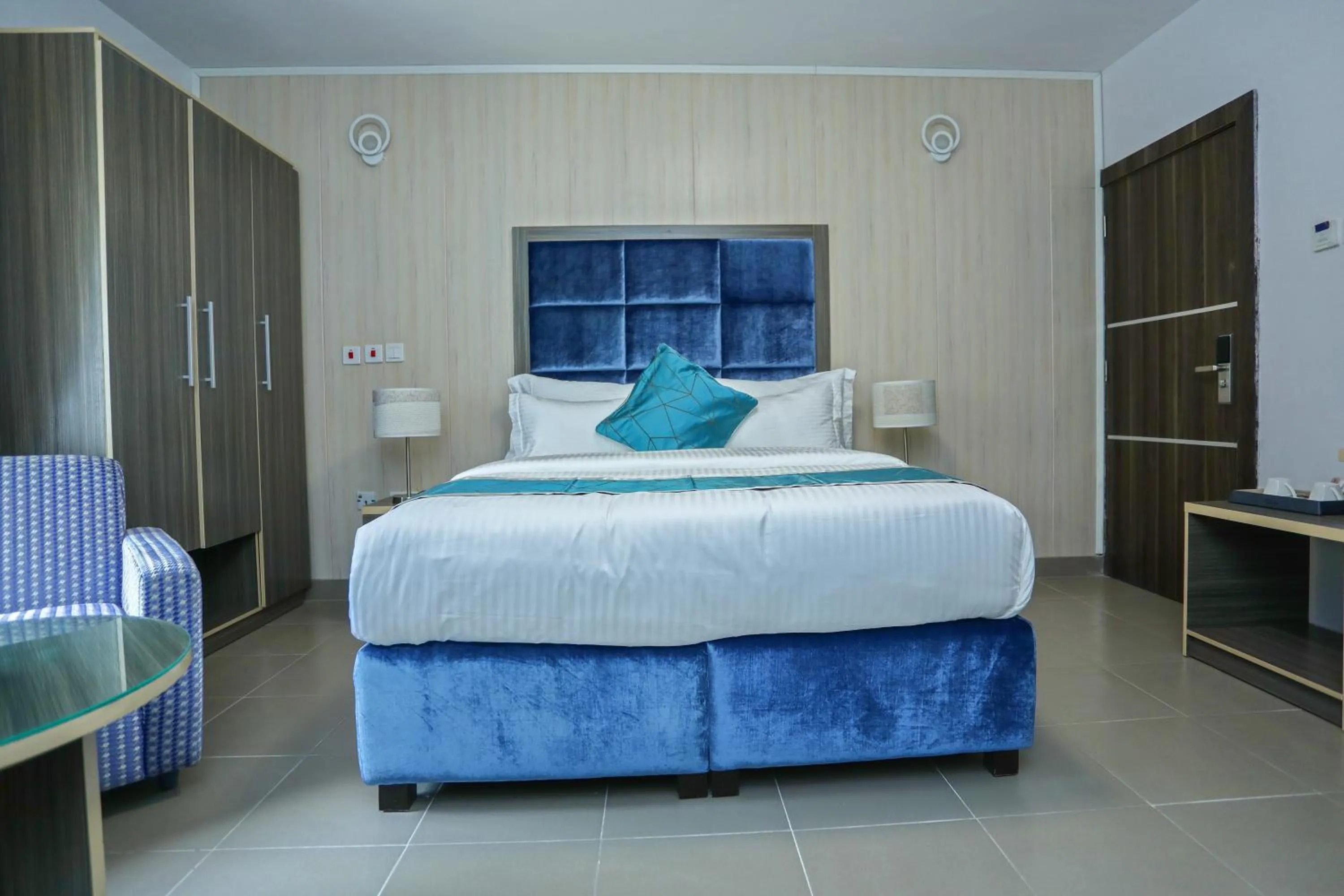 Bed in Riviera Suites