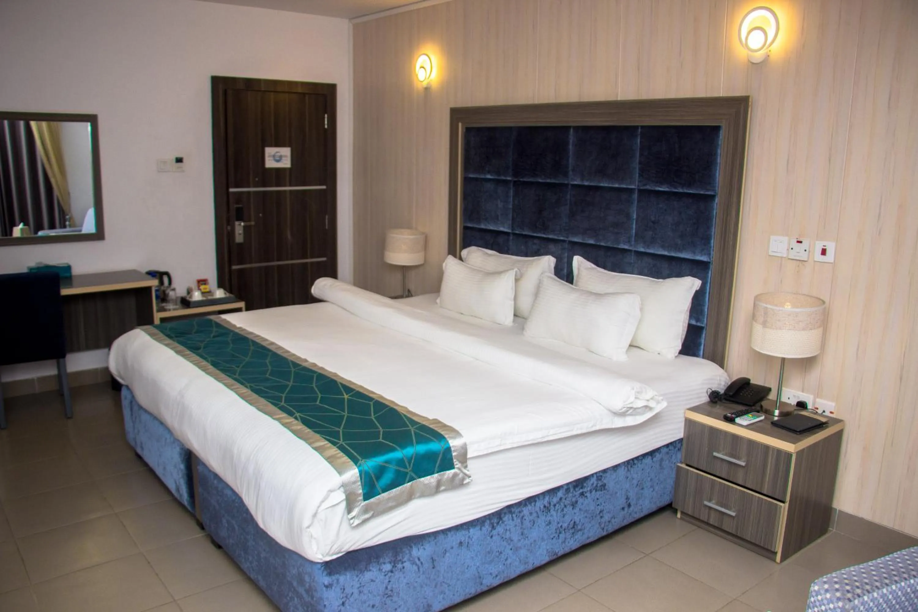 Bed in Riviera Suites