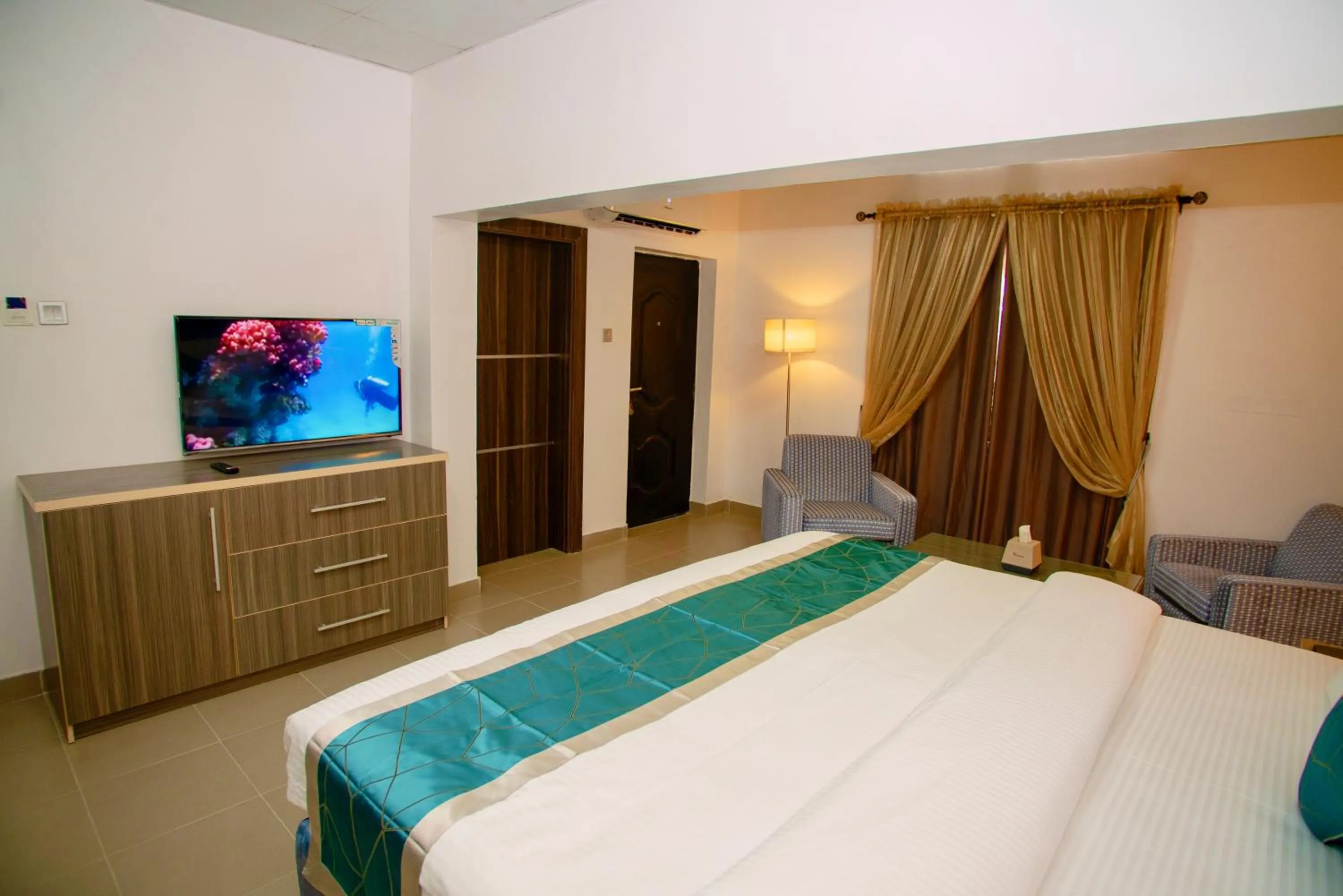 Bed in Riviera Suites