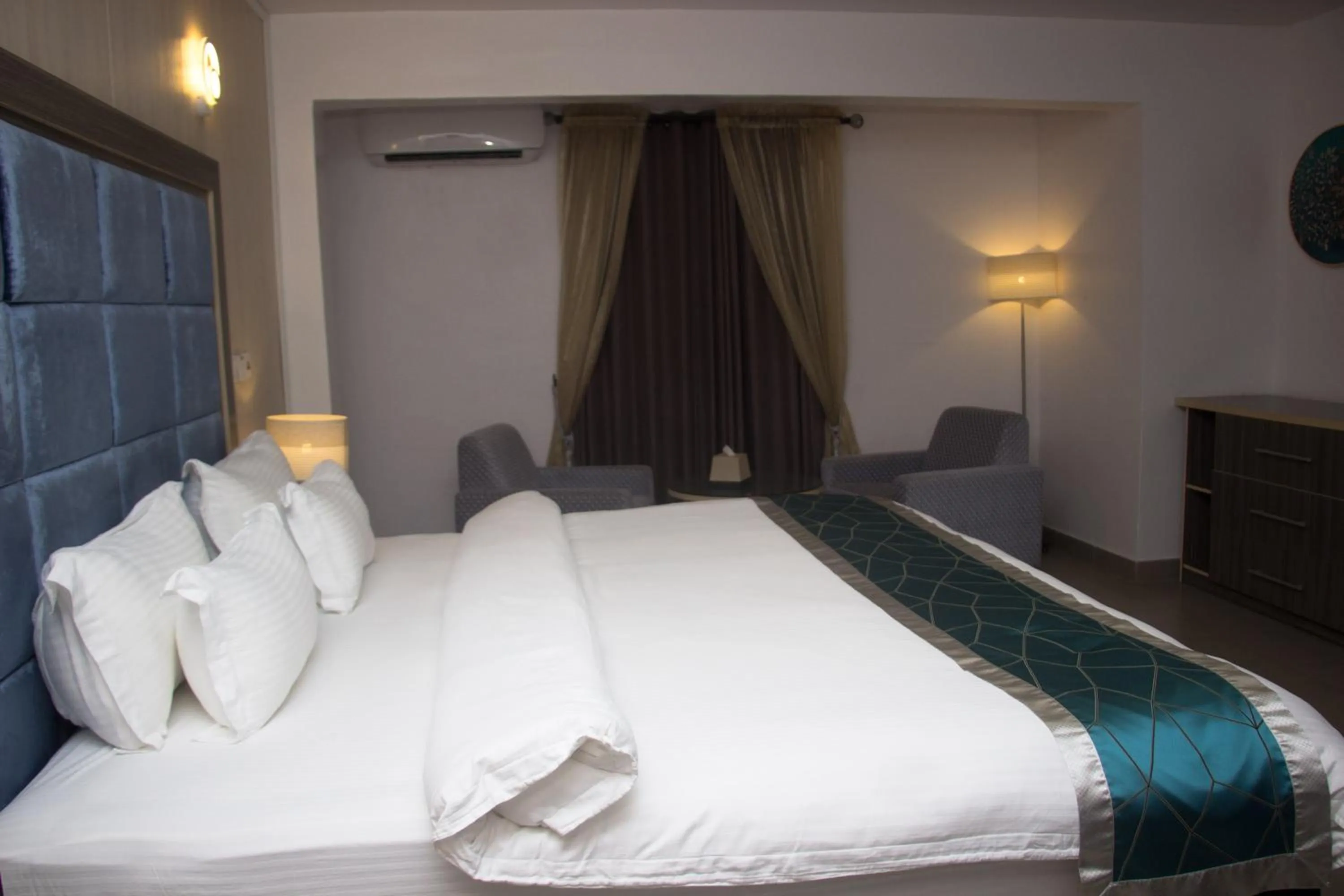 Bed in Riviera Suites