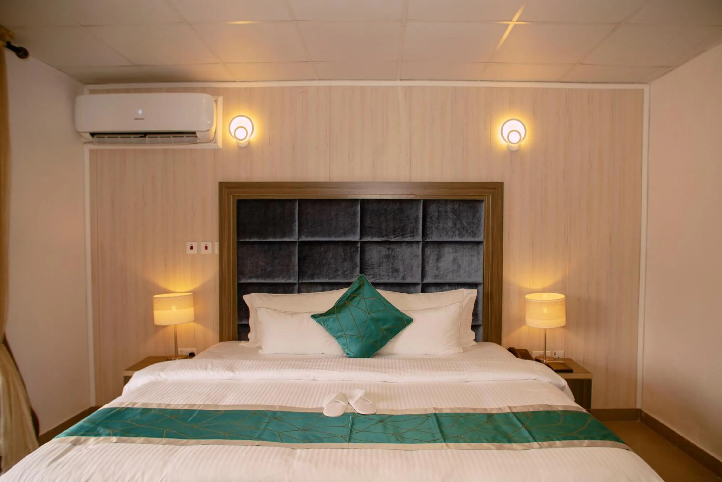 Bed in Riviera Suites