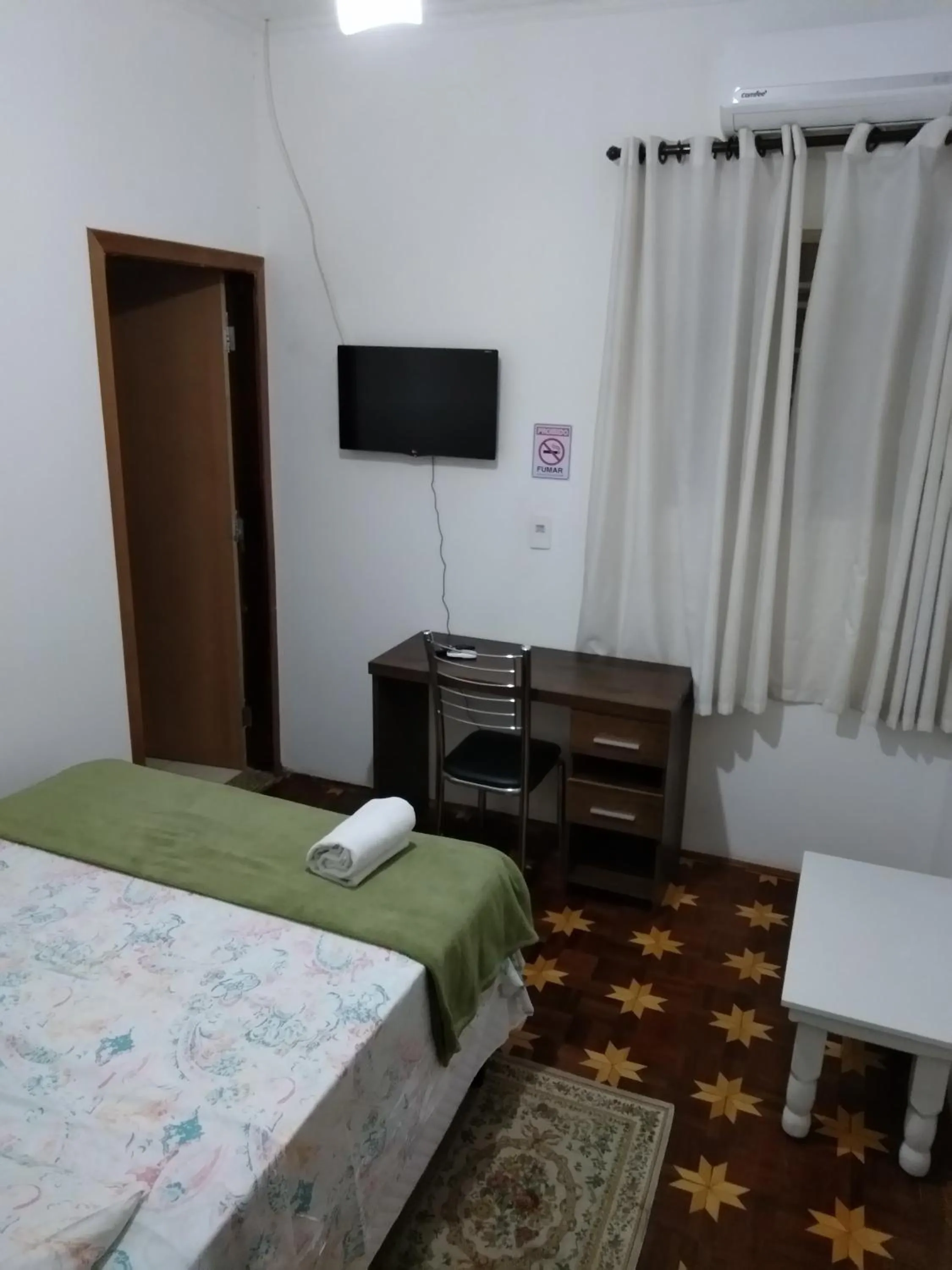 Bed in Ipê Rosa Hotel