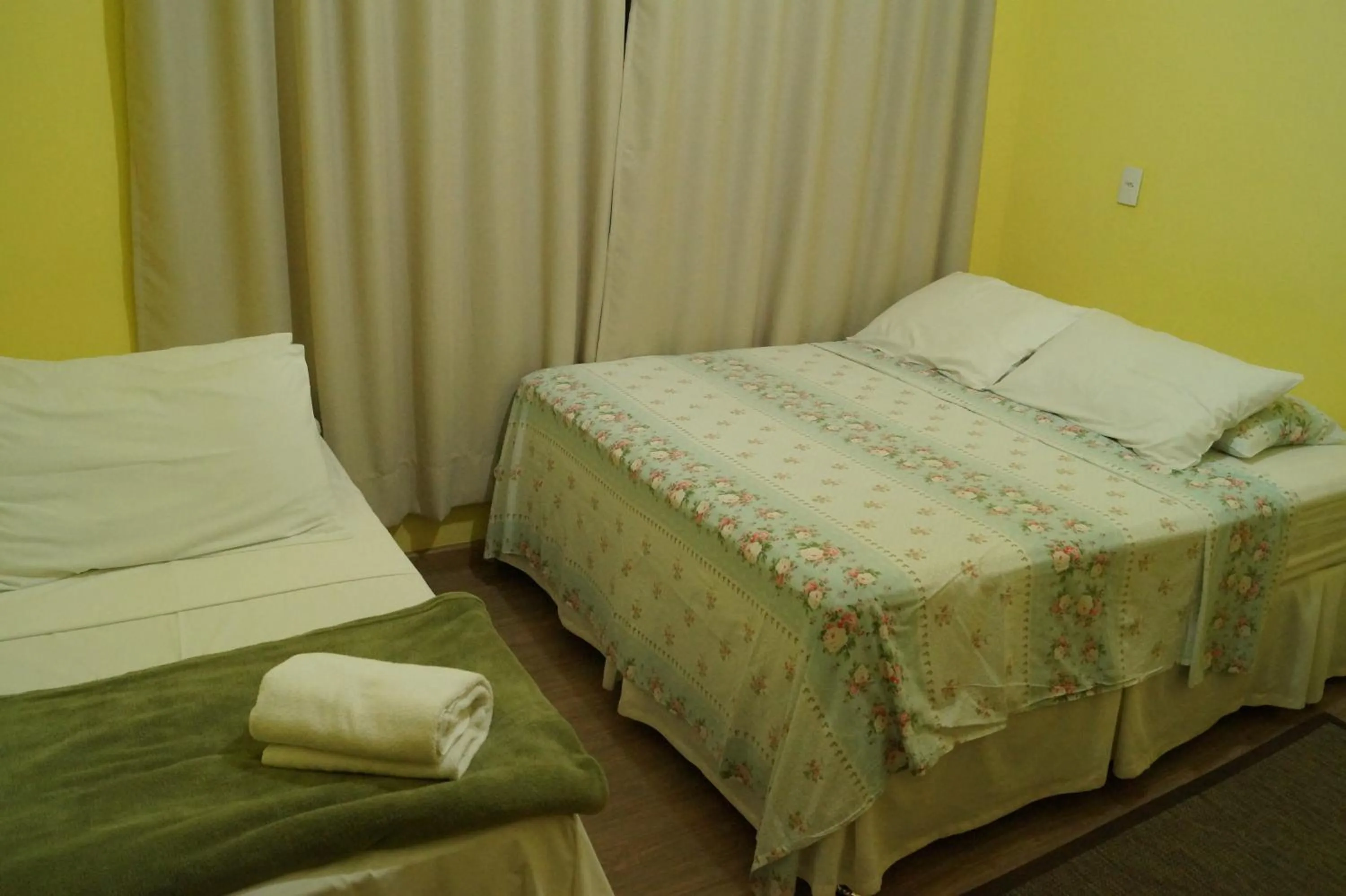 Bed in Ipê Rosa Hotel