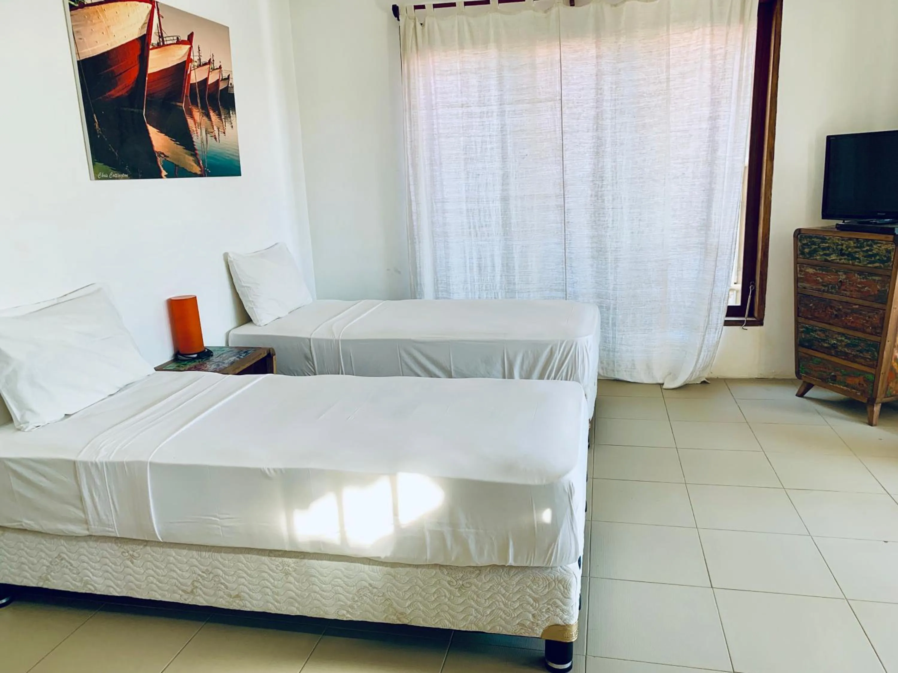 Photo of the whole room, Bed in The Palms Ceningan Hotel